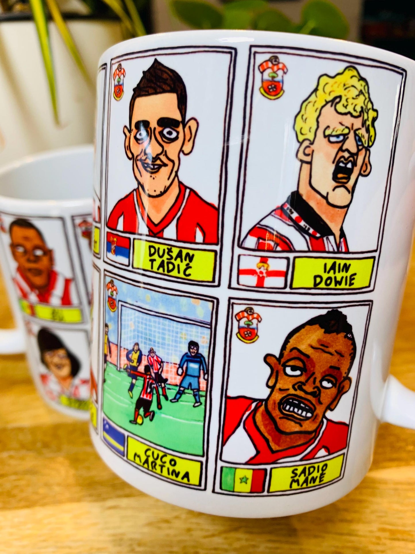 Southampton - Set of TWO 11oz Ceramic Mugs with Wonky Panini sticker-style No Score Draws Doodles of 24 Saints icons - NEW for 2025!