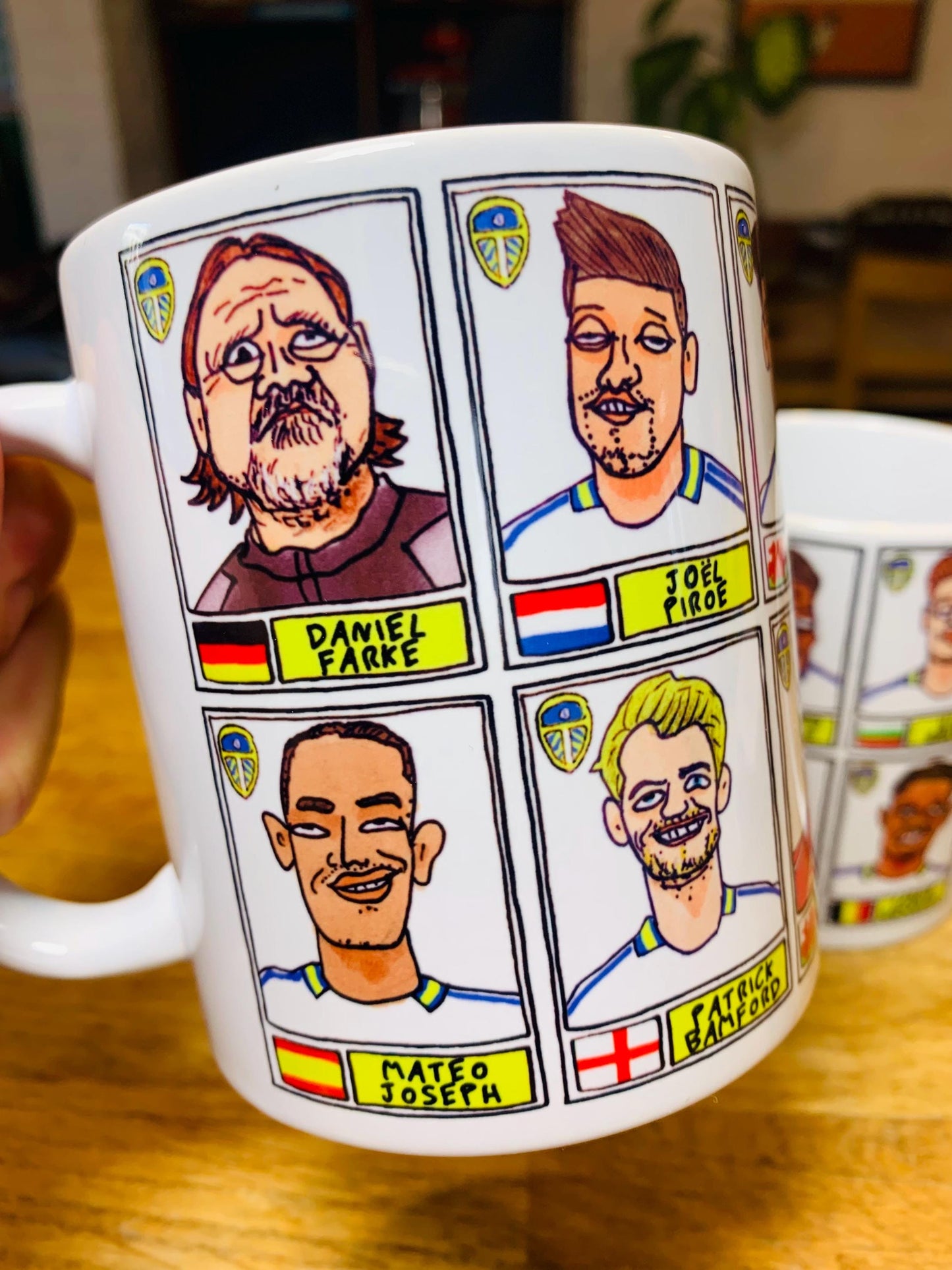 Leeds United Vol 4 No Score Draws Mug Set - Set of TWO 11oz Ceramic Mugs with Wonky Panini-Doodles Of LUFC's 24/25 Promotion Winning Squad