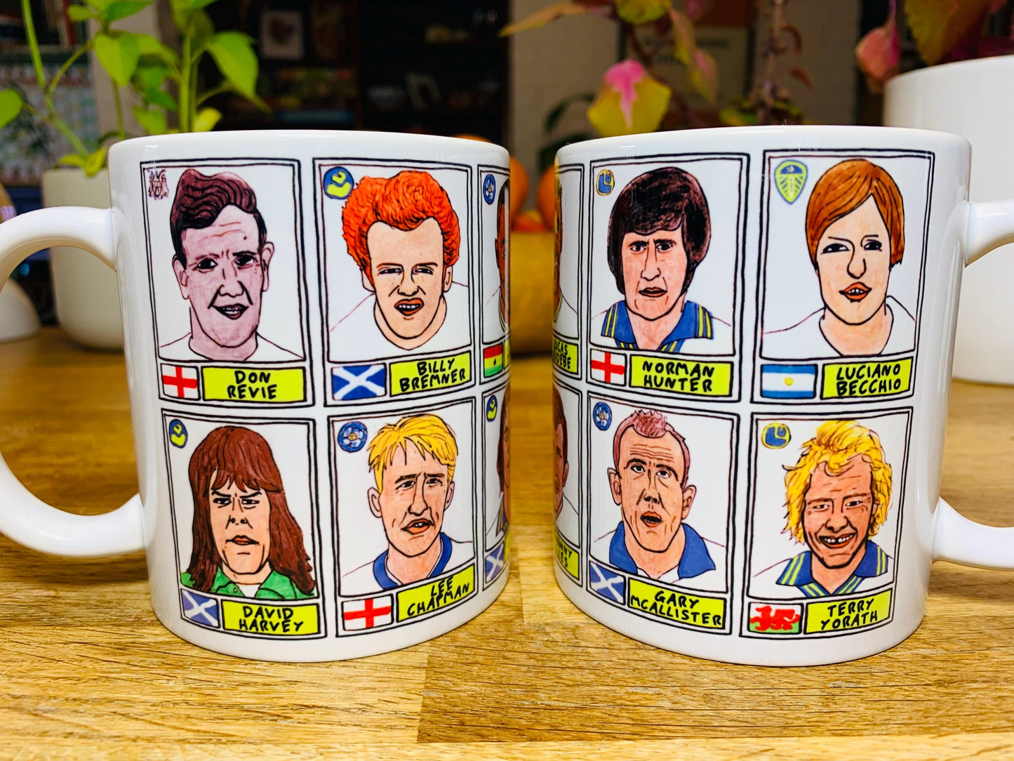 Leeds United Vol 1 No Score Draws Mug Set - Set of TWO 11oz Ceramic Mugs with Wonky Panini-style No Score Draws Doodles of LUFC legends