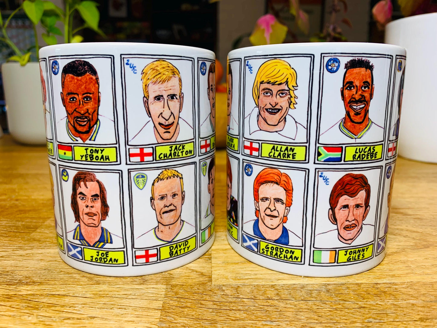 Leeds United Vol 1 No Score Draws Mug Set - Set of TWO 11oz Ceramic Mugs with Wonky Panini-style No Score Draws Doodles of LUFC legends