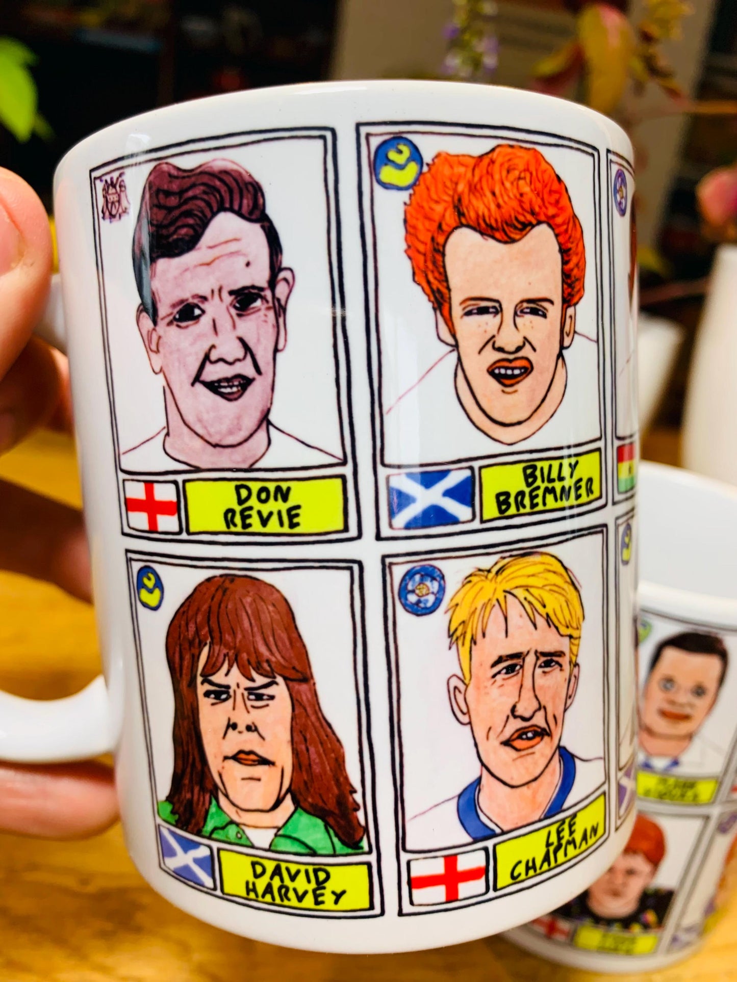 Leeds United Vol 1 No Score Draws Mug Set - Set of TWO 11oz Ceramic Mugs with Wonky Panini-style No Score Draws Doodles of LUFC legends