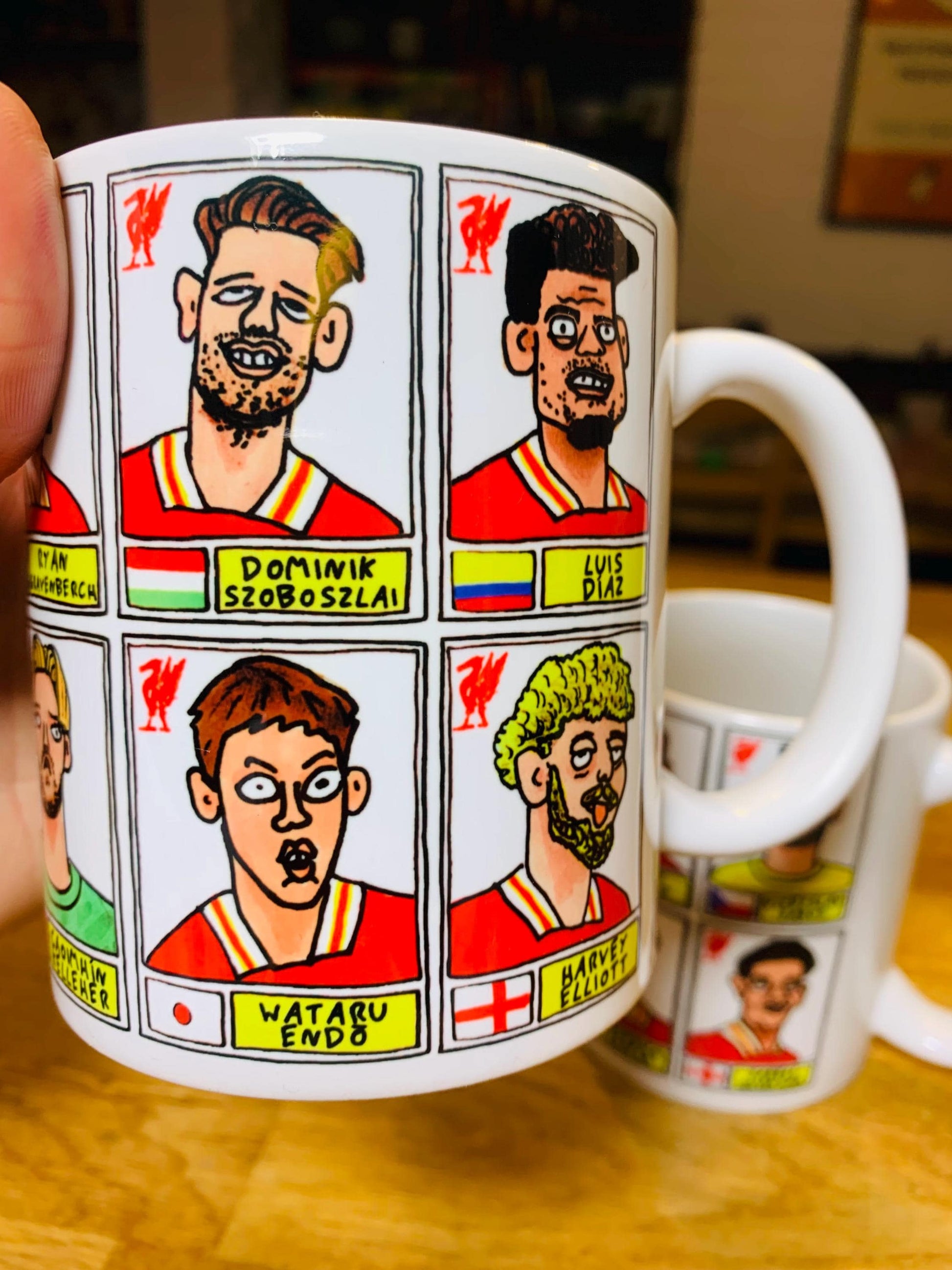 Liverpool Vol 6 24-25 No Score Draws Mug Set - Set of TWO DIFFERENT 11oz Ceramic Mugs with 24 Wonky Panini sticker-style LFC FootballDoodles