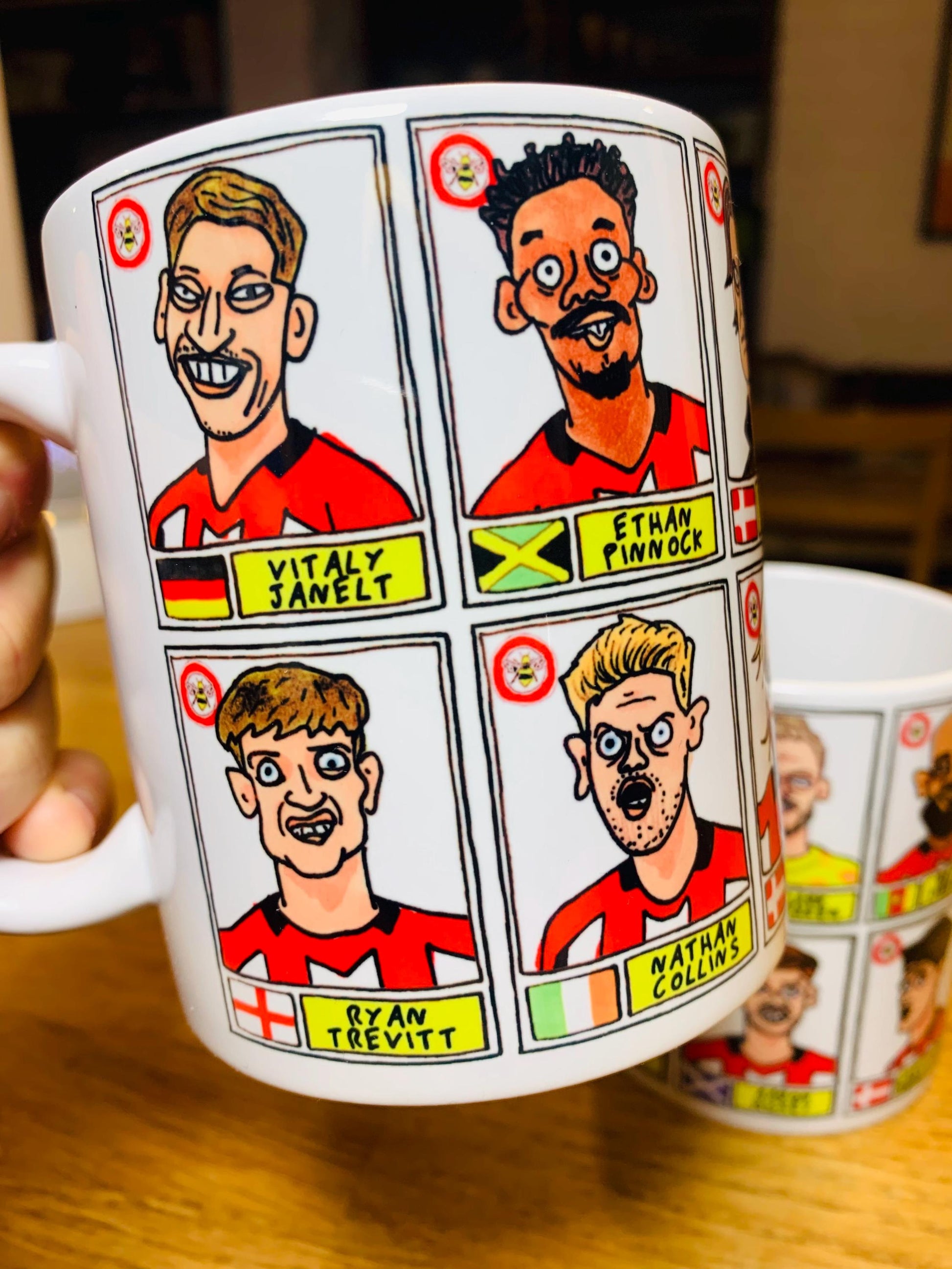 Brentford Vol 3 No Score Draws Mug Set - Set of TWO DIFFERENT 11oz Ceramic Mugs with Wonky Panini-Style Doodles Of Thomas Frank's 24/25 Team