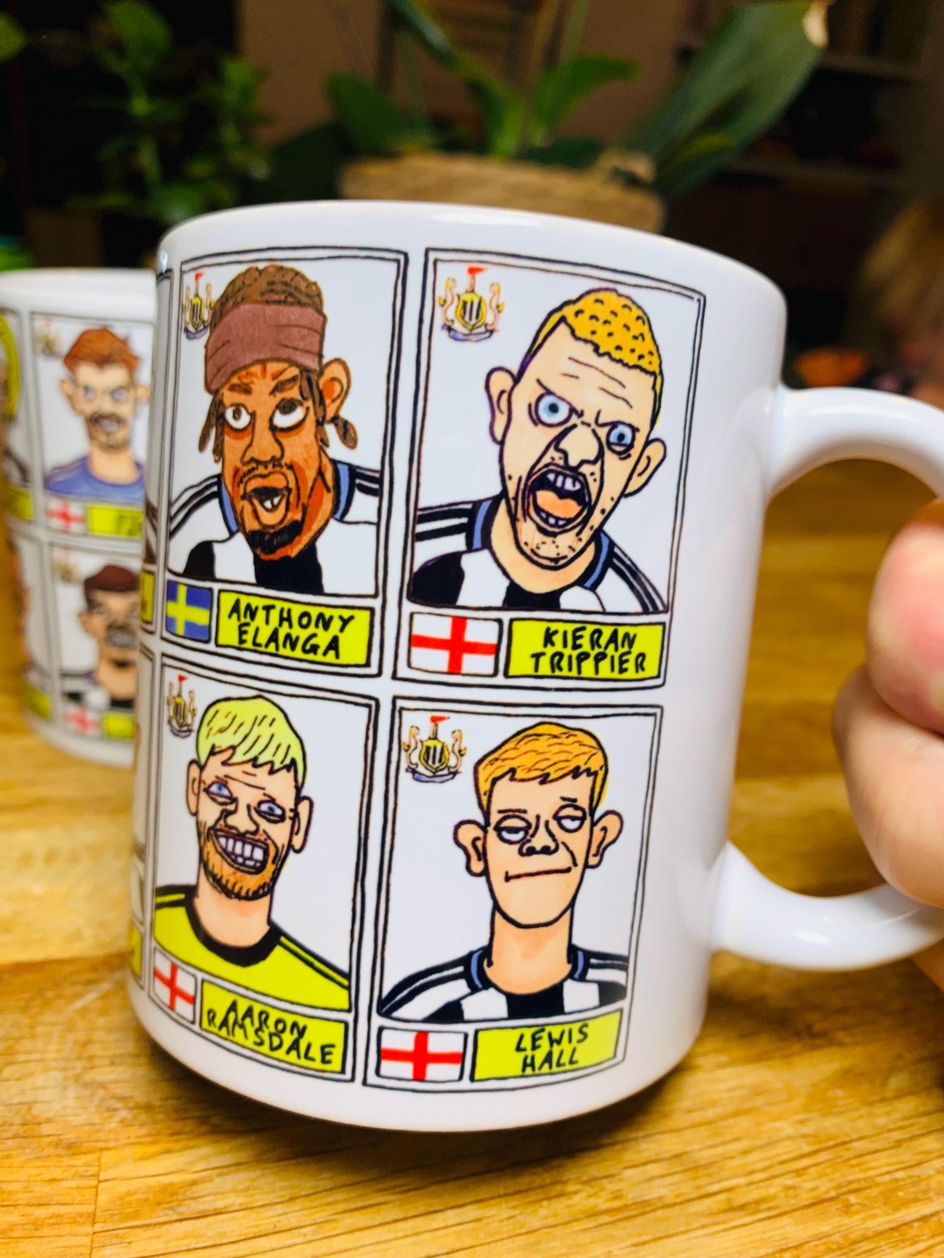 Newcastle United 25/26 - No Score Draws Mug Set - Set of TWO DIFFERENT 11oz Ceramic Mugs with 24 Wonky Panini-Doodles of NUFC 25/26 Magpies