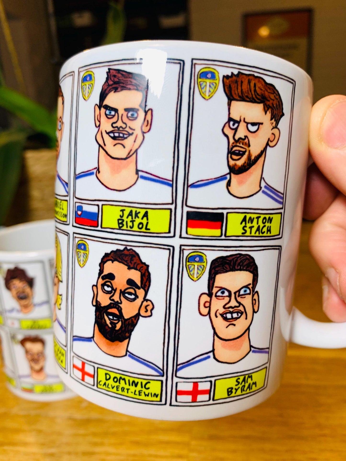 Leeds United Vol 4 No Score Draws Mug Set - Set of TWO 11oz Ceramic Mugs with Wonky Panini-Doodles Of LUFC's 24/25 Promotion Winning Squad