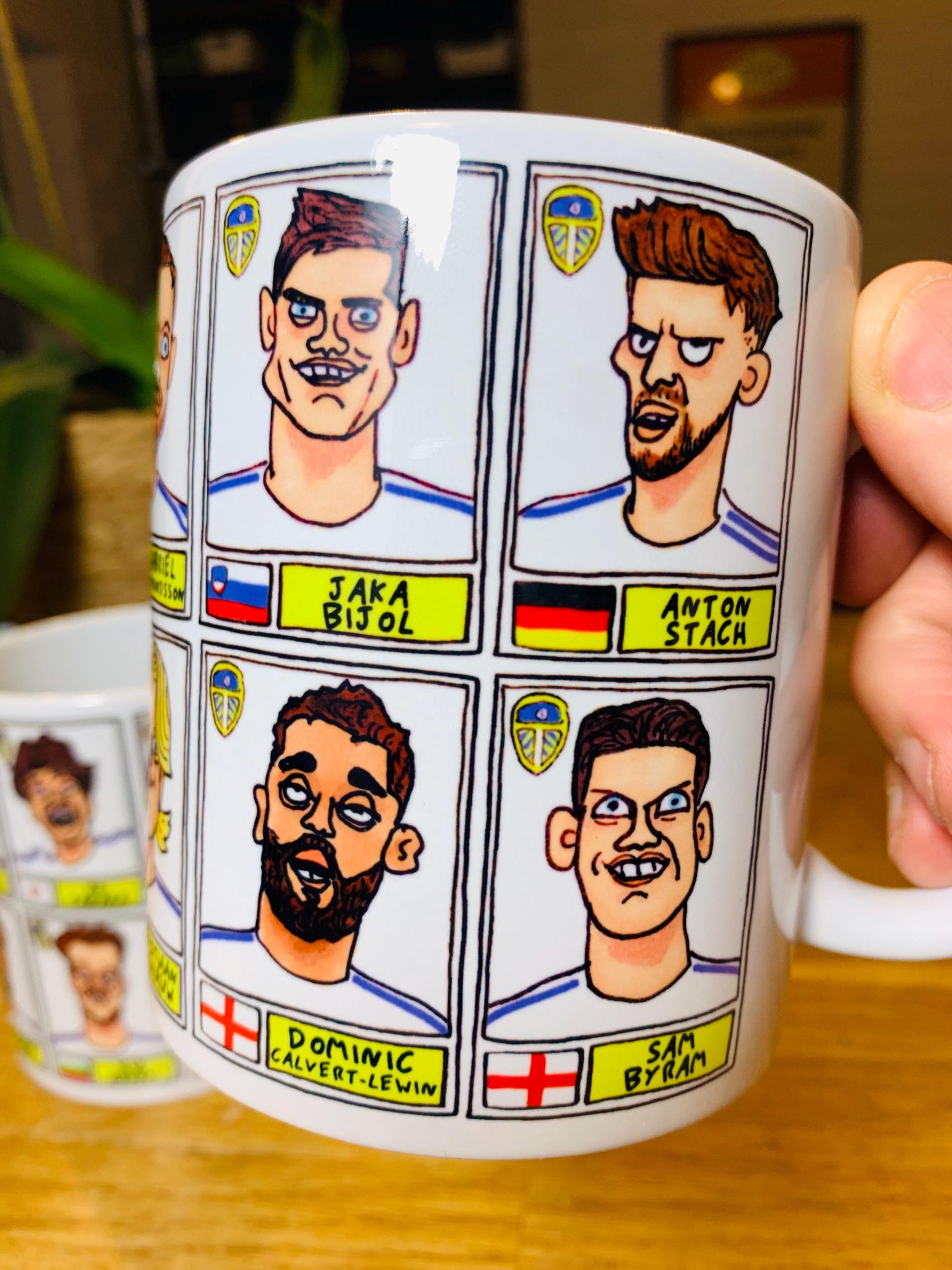 Leeds United Vol 4 No Score Draws Mug Set - Set of TWO 11oz Ceramic Mugs with Wonky Panini-Doodles Of LUFC's 24/25 Promotion Winning Squad