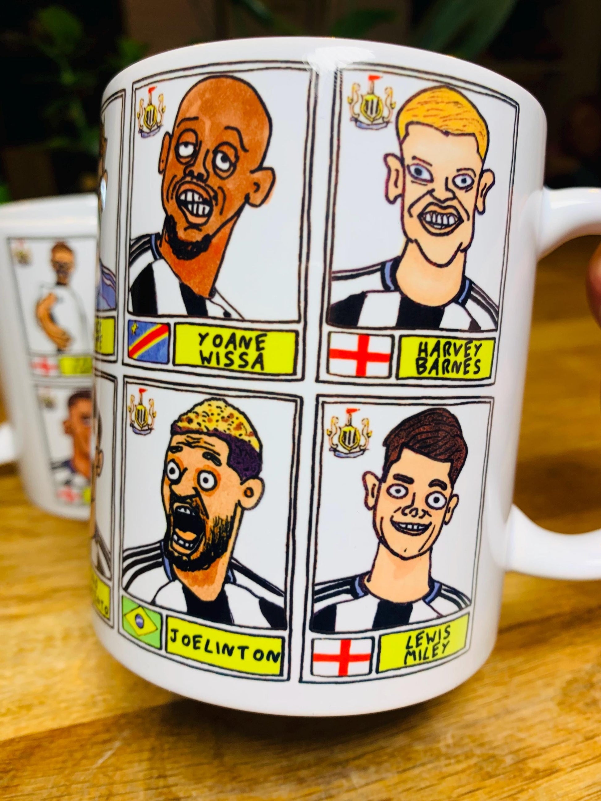 Newcastle United 25/26 - No Score Draws Mug Set - Set of TWO DIFFERENT 11oz Ceramic Mugs with 24 Wonky Panini-Doodles of NUFC 25/26 Magpies