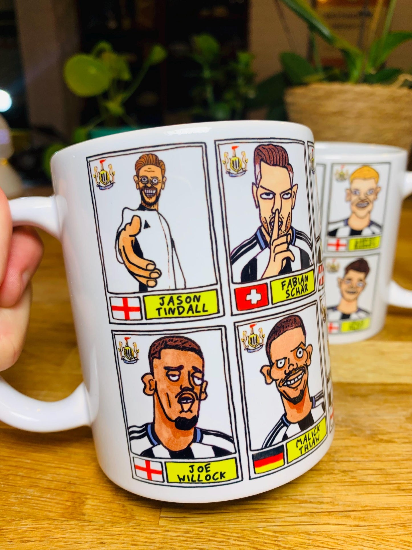 Newcastle United 25/26 - No Score Draws Mug Set - Set of TWO DIFFERENT 11oz Ceramic Mugs with 24 Wonky Panini-Doodles of NUFC 25/26 Magpies