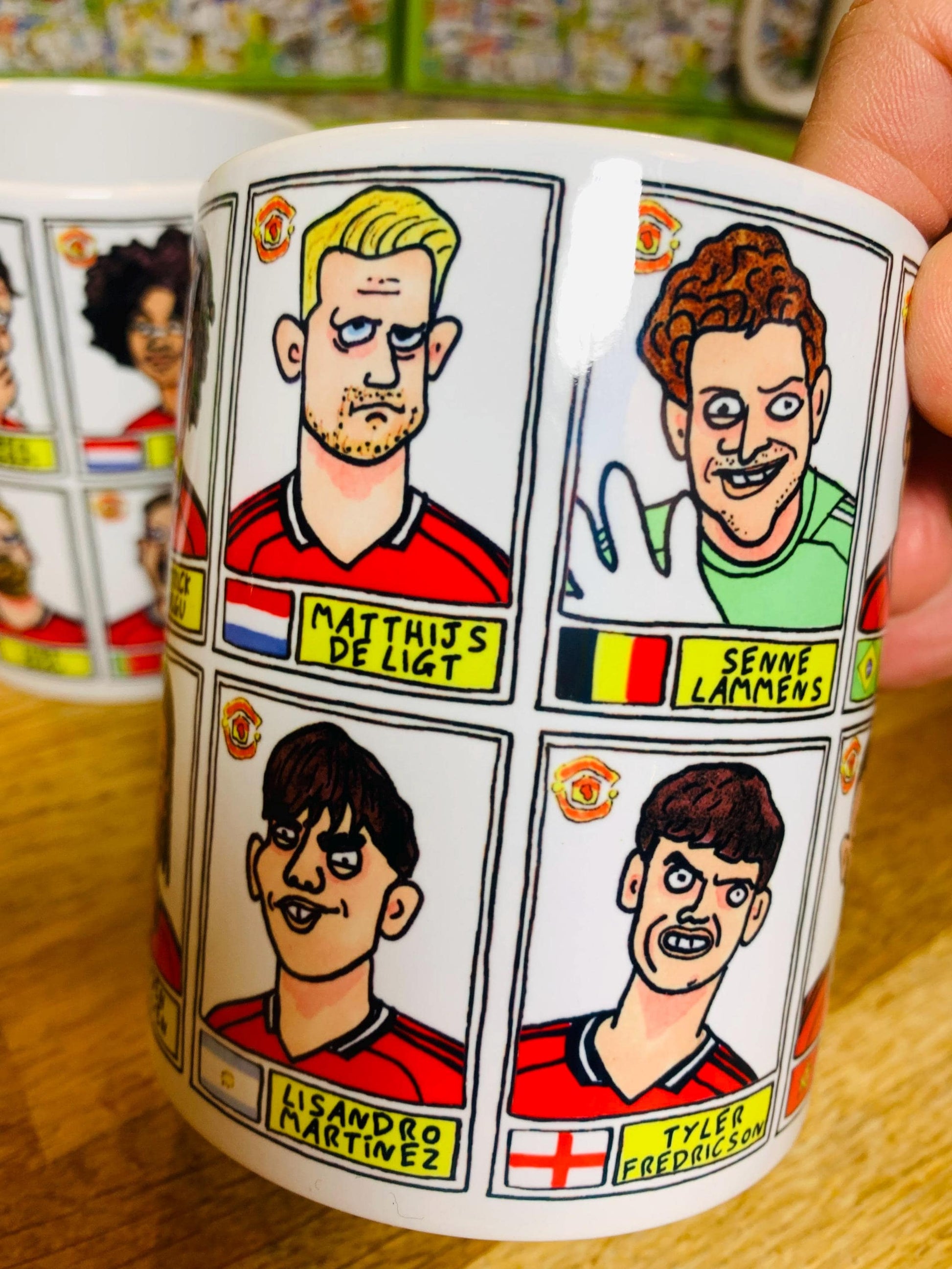 Man Utd 25/26 No Score Draws Mug Set - Set of TWO DIFFERENT 11oz Ceramic Mugs with Wonky Panini-style MUFC Doodles Of Manchester United