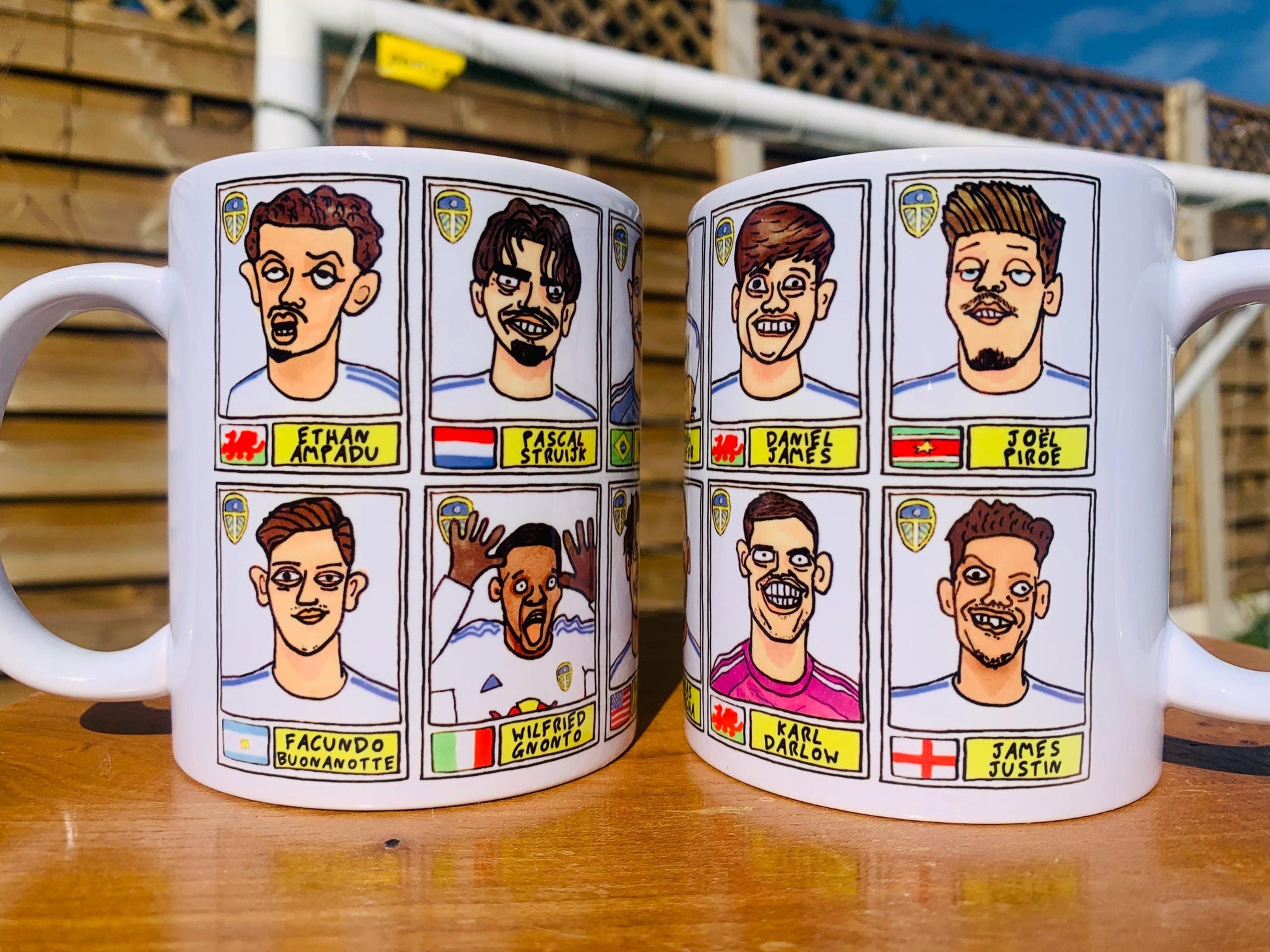 Leeds United 25/26 No Score Draws Mug Set - Set of TWO DIFFERENT 11oz Ceramic Mugs with Wonky Panini-Doodles Of Daniel Farke's PL Squad