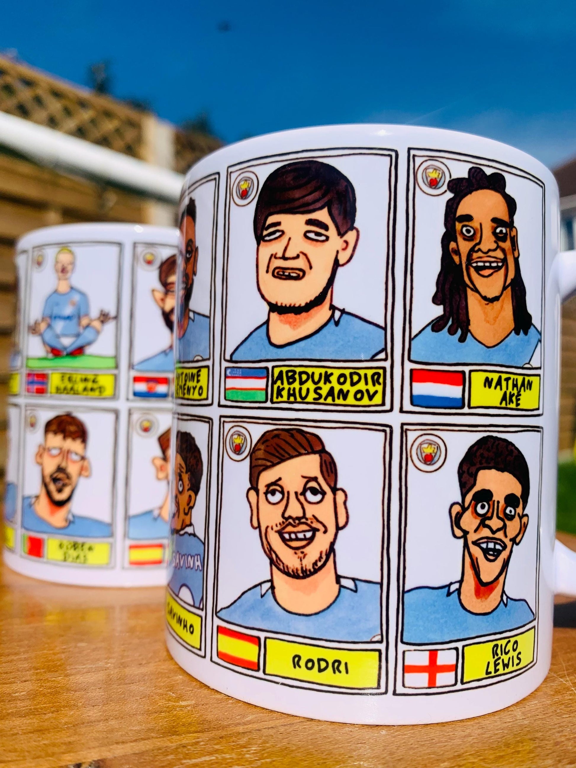 Man City 25/26 - No Score Draws Mug Set - Set of TWO DIFFERENT 11oz Ceramic Mugs with 24 Wonky MCFC Doodles Of Manchester City's 25/26 Squad