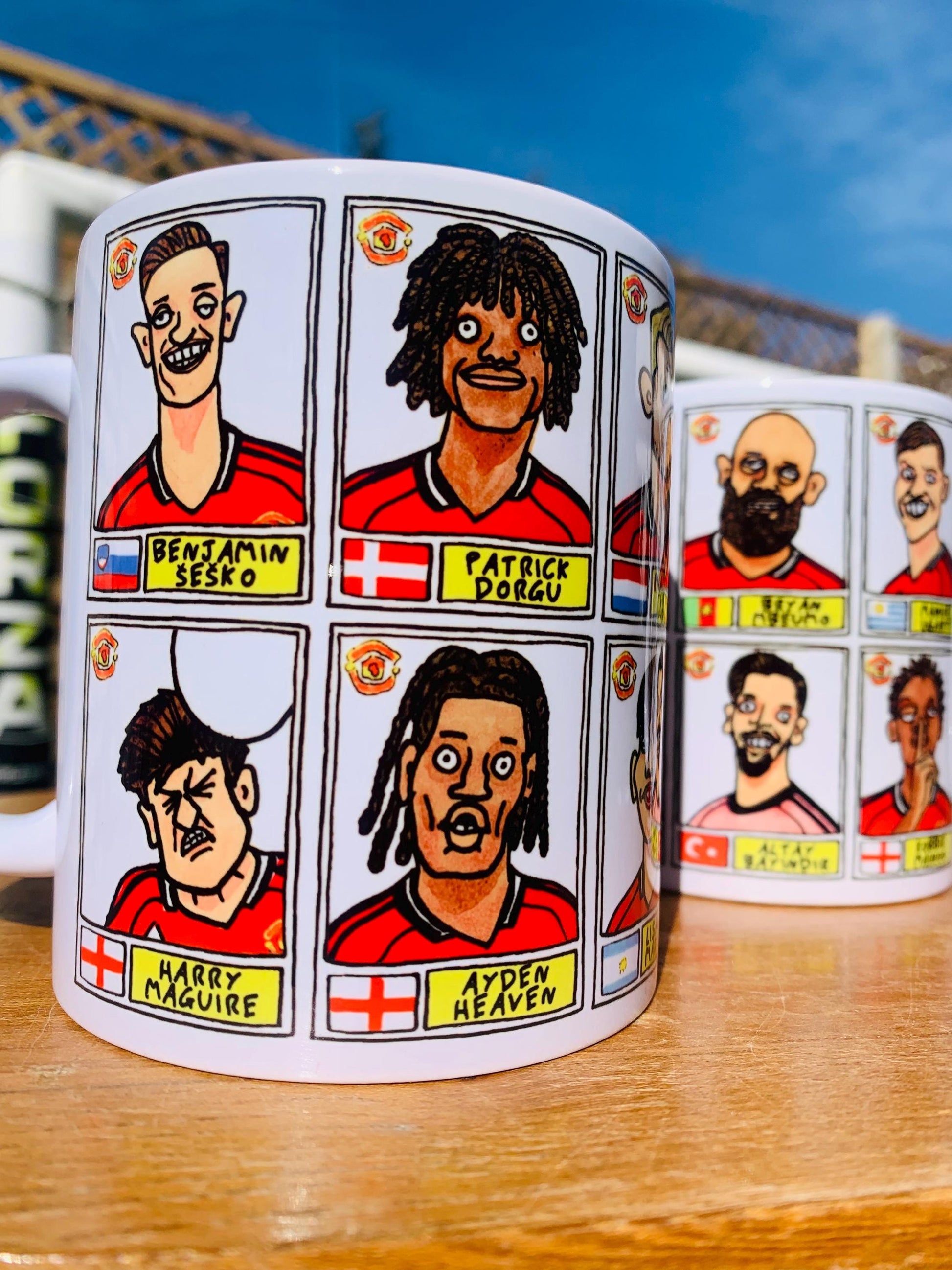 Man Utd 25/26 No Score Draws Mug Set - Set of TWO DIFFERENT 11oz Ceramic Mugs with Wonky Panini-style MUFC Doodles Of Manchester United