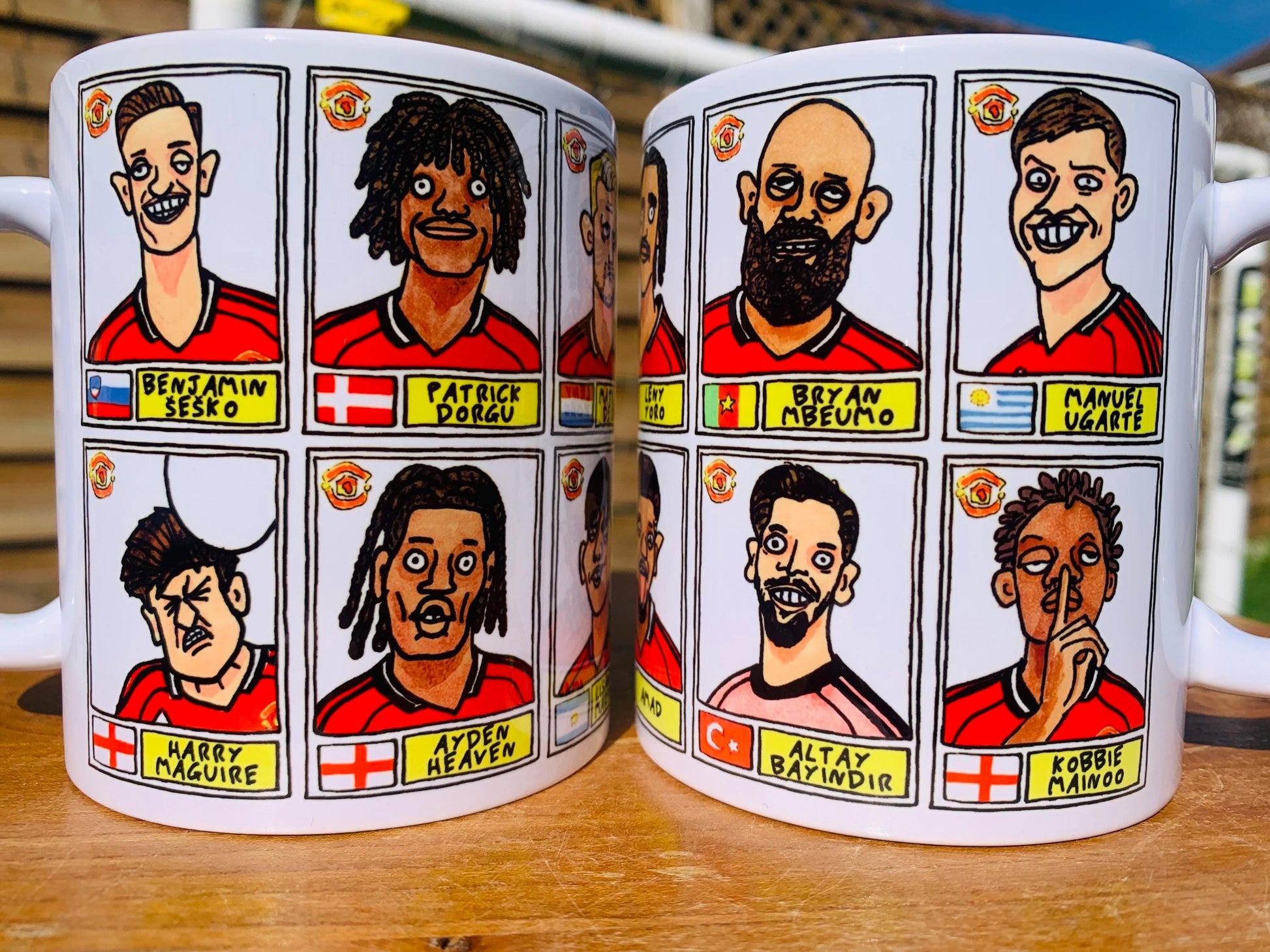 Man Utd 25/26 No Score Draws Mug Set - Set of TWO DIFFERENT 11oz Ceramic Mugs with Wonky Panini-style MUFC Doodles Of Manchester United