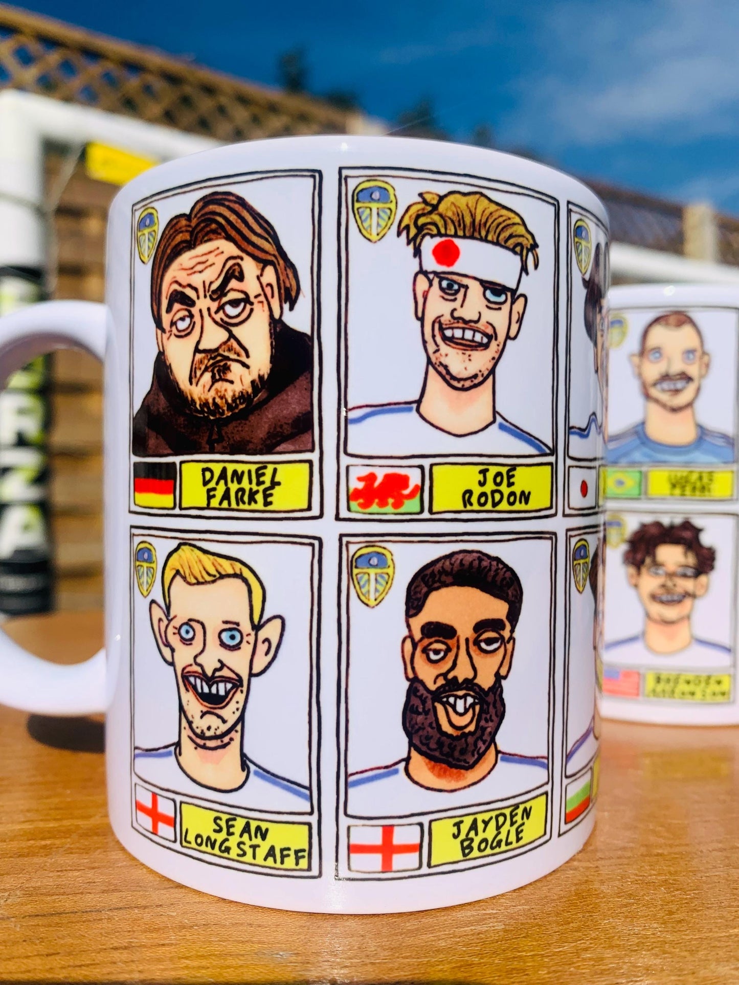 Leeds United 25/26 No Score Draws Mug Set - Set of TWO DIFFERENT 11oz Ceramic Mugs with Wonky Panini-Doodles Of Daniel Farke's PL Squad