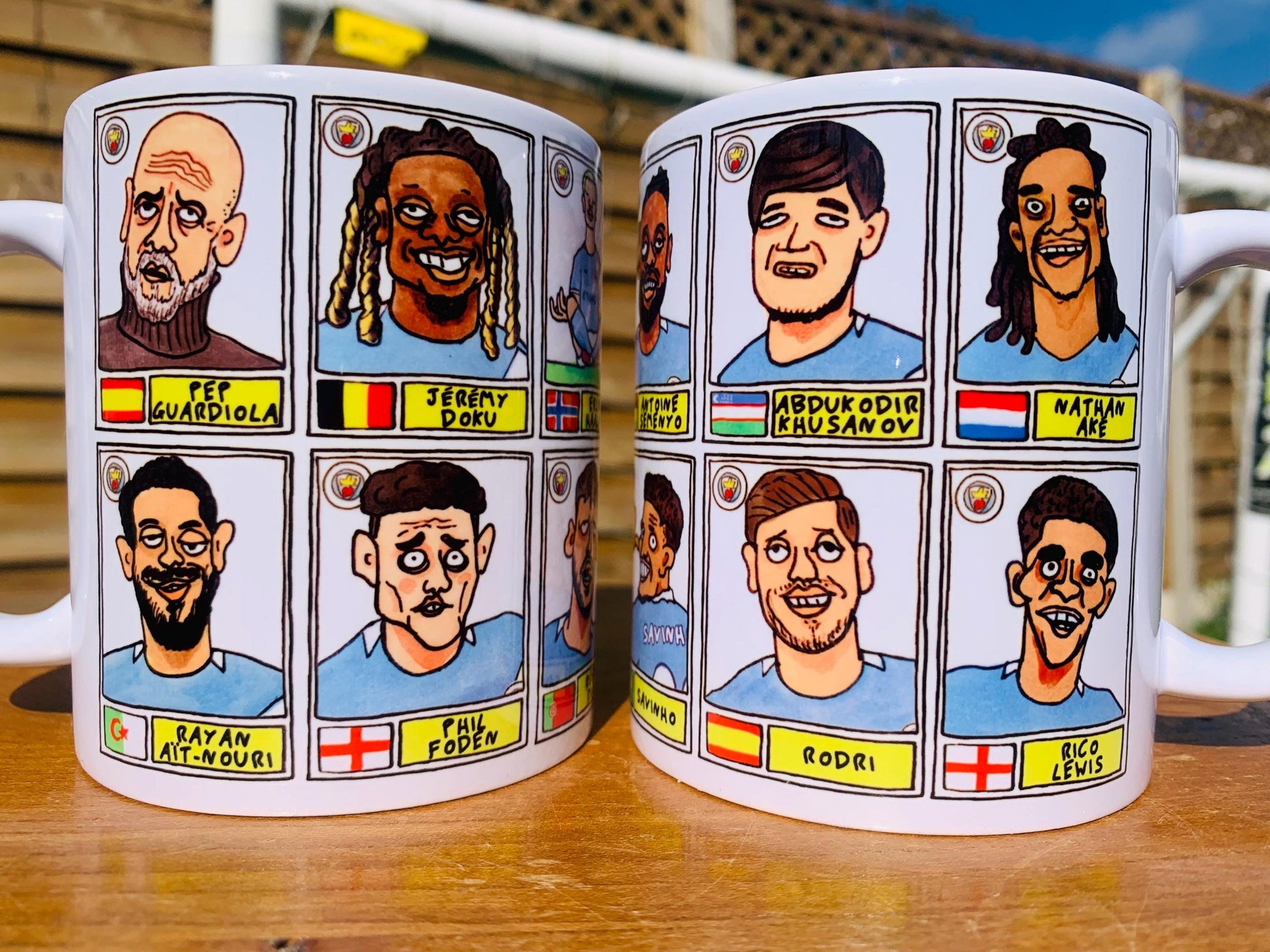 Man City 25/26 - No Score Draws Mug Set - Set of TWO DIFFERENT 11oz Ceramic Mugs with 24 Wonky MCFC Doodles Of Manchester City's 25/26 Squad