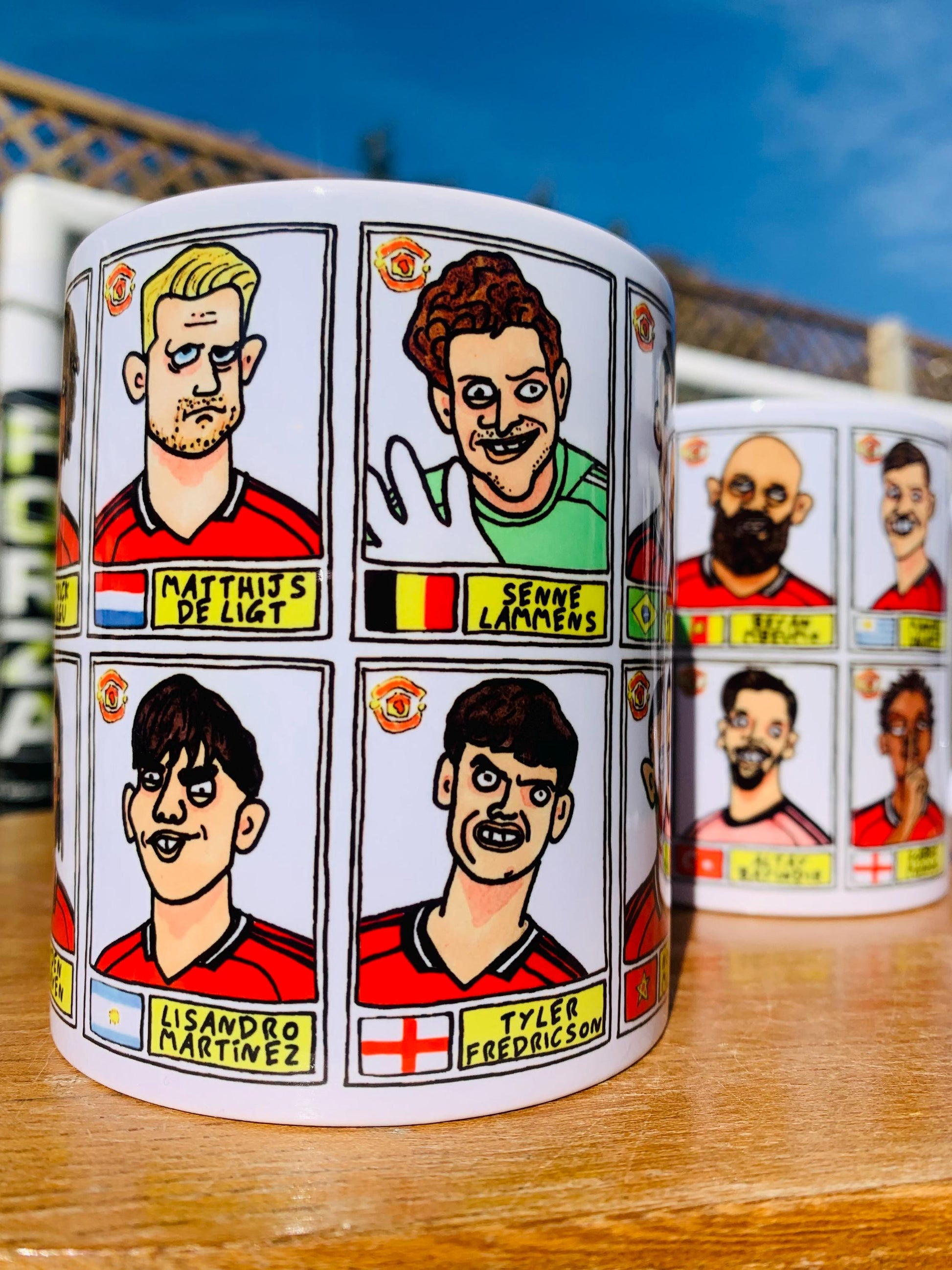 Man Utd 25/26 No Score Draws Mug Set - Set of TWO DIFFERENT 11oz Ceramic Mugs with Wonky Panini-style MUFC Doodles Of Manchester United