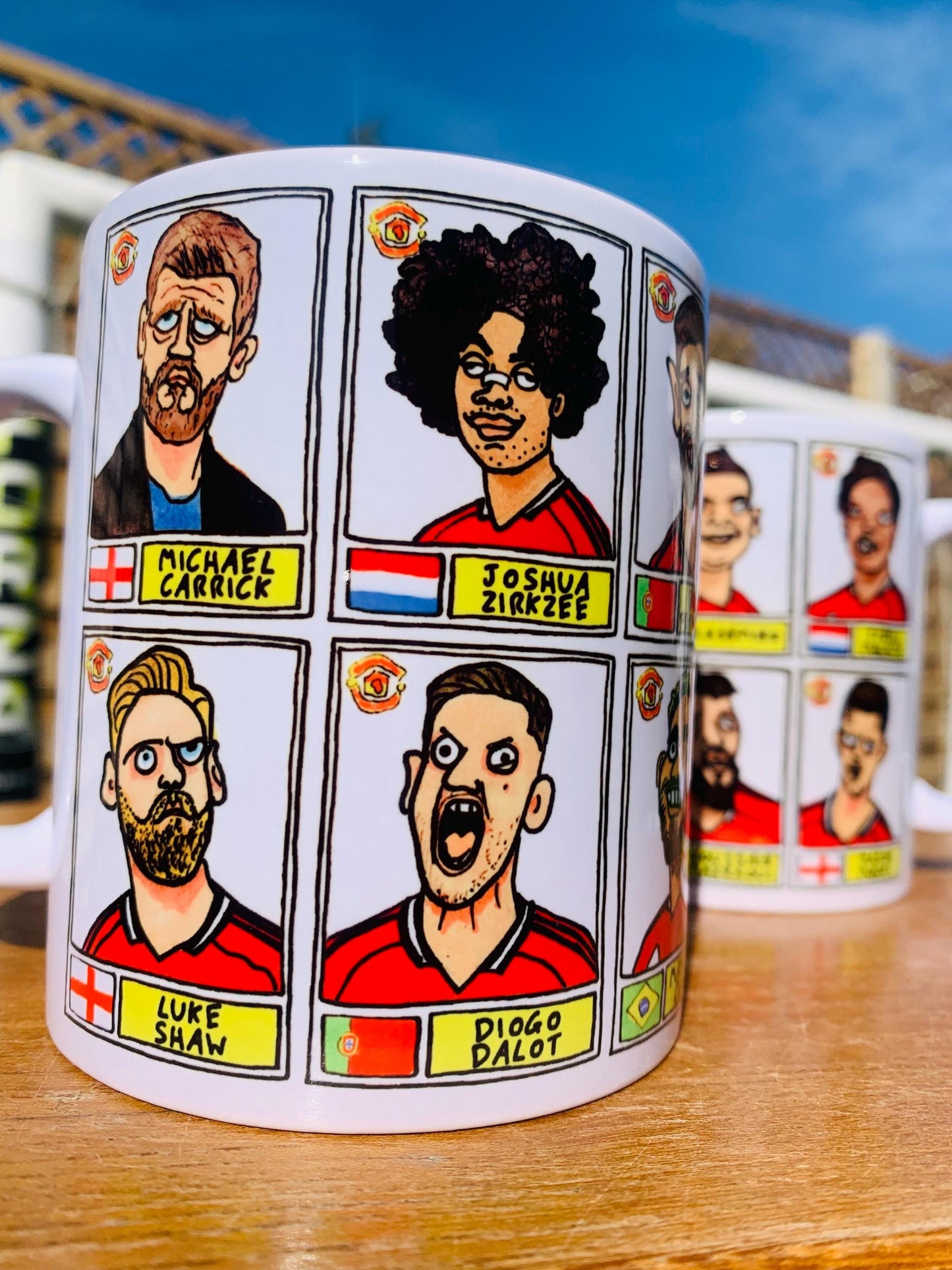 Man Utd 25/26 No Score Draws Mug Set - Set of TWO DIFFERENT 11oz Ceramic Mugs with Wonky Panini-style MUFC Doodles Of Manchester United