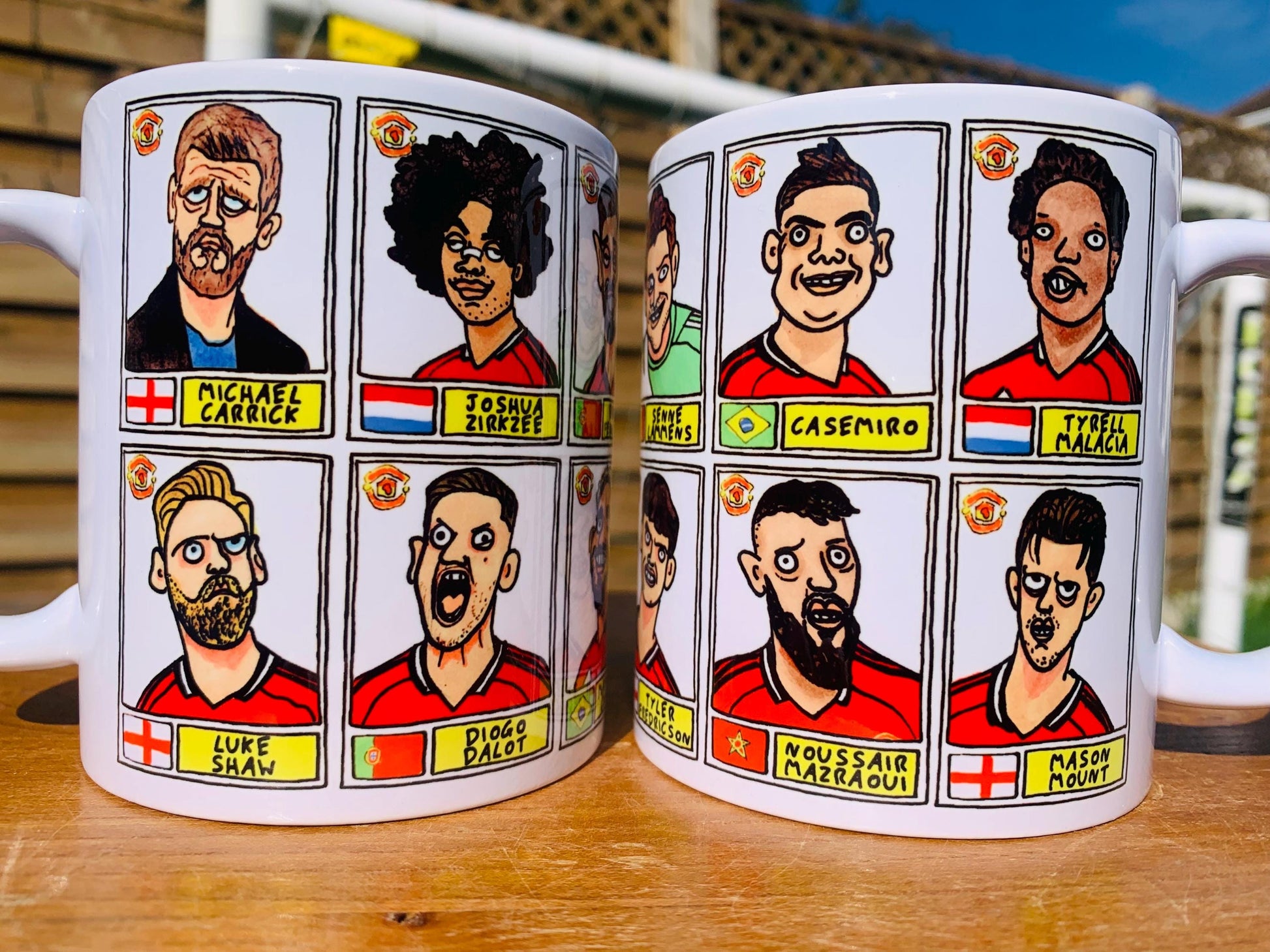 Man Utd 25/26 No Score Draws Mug Set - Set of TWO DIFFERENT 11oz Ceramic Mugs with Wonky Panini-style MUFC Doodles Of Manchester United