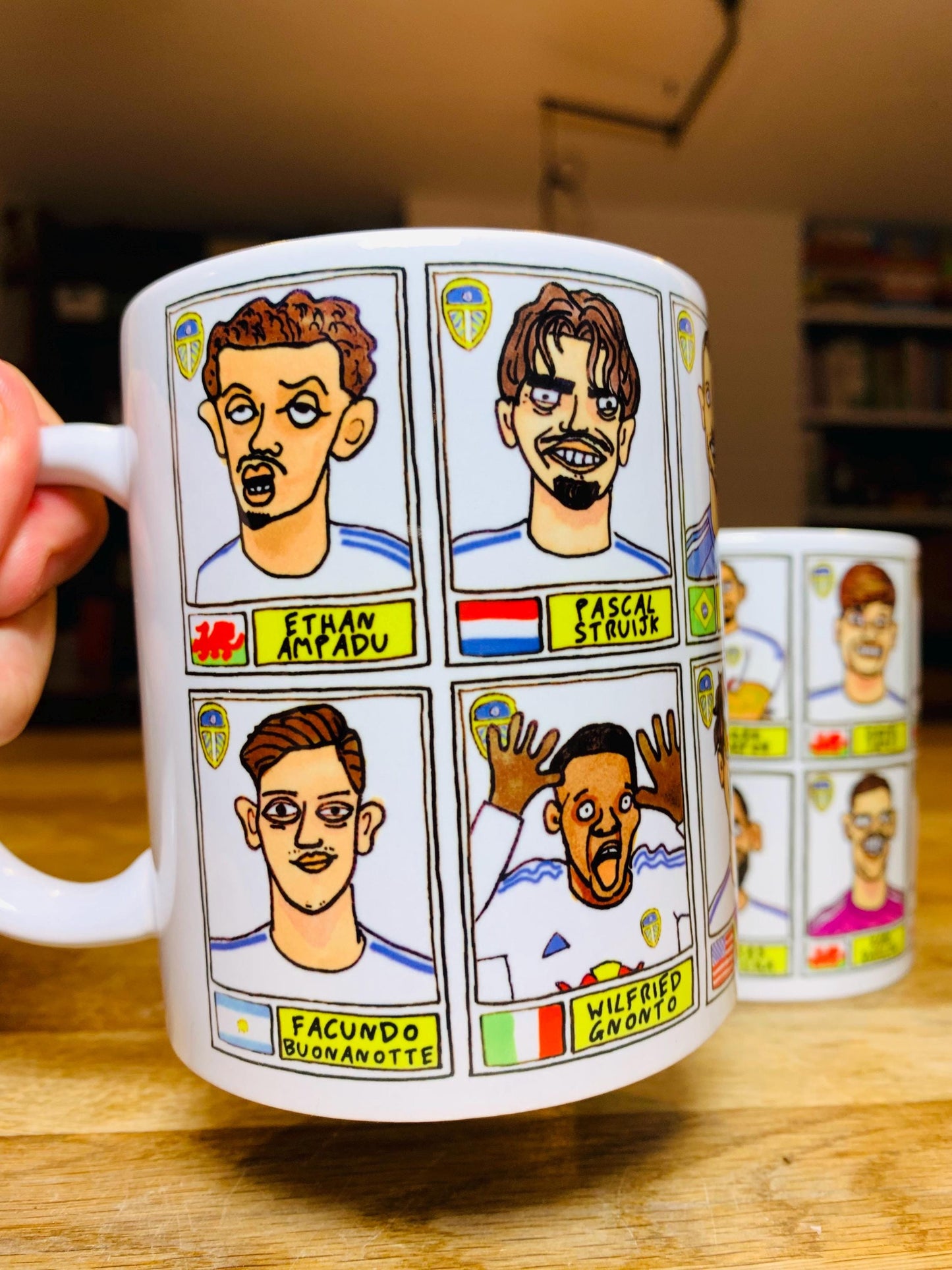 Leeds United 25/26 No Score Draws Mug Set - Set of TWO DIFFERENT 11oz Ceramic Mugs with Wonky Panini-Doodles Of Daniel Farke's PL Squad
