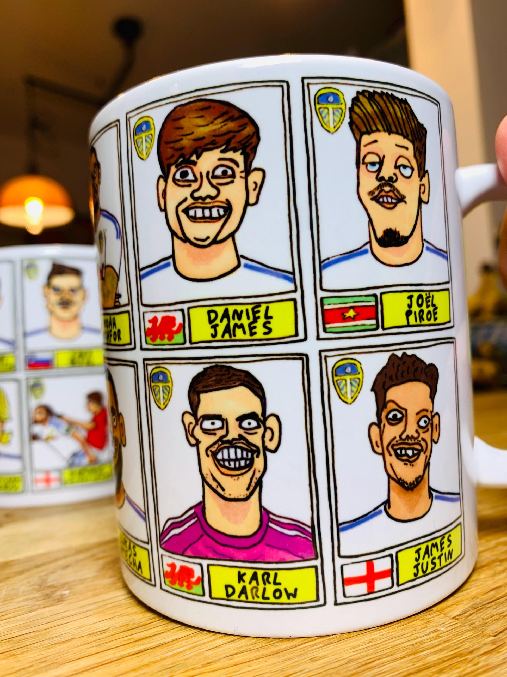 Leeds United 25/26 No Score Draws Mug Set - Set of TWO DIFFERENT 11oz Ceramic Mugs with Wonky Panini-Doodles Of Daniel Farke's PL Squad