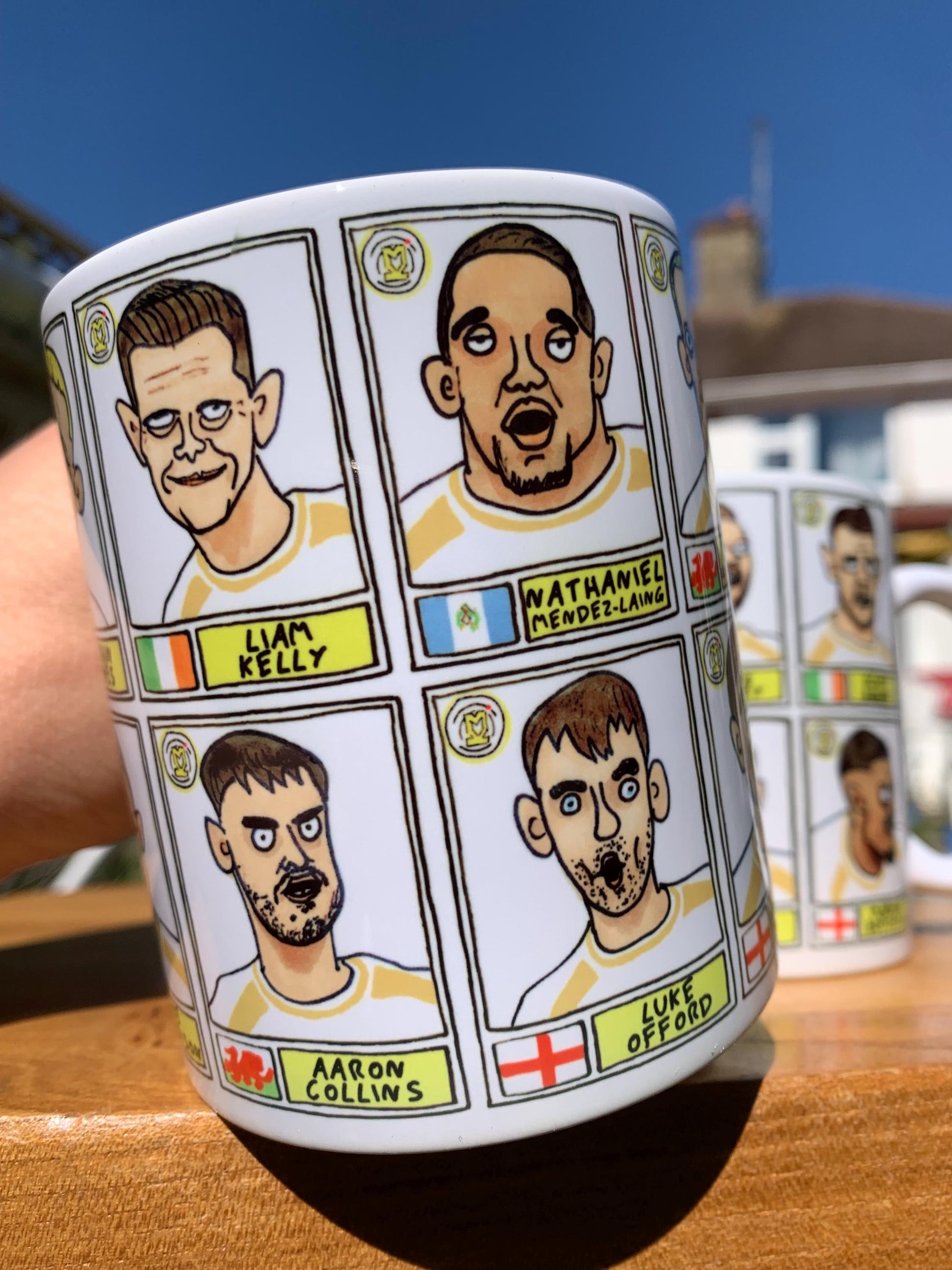 MK Dons - Dons Going Up No Score Draws Mug Set - Set of Two DIFFERENT 11oz Ceramic Mugs with Wonky Doodles Of MKDFC 25/26 Promotion-Winners