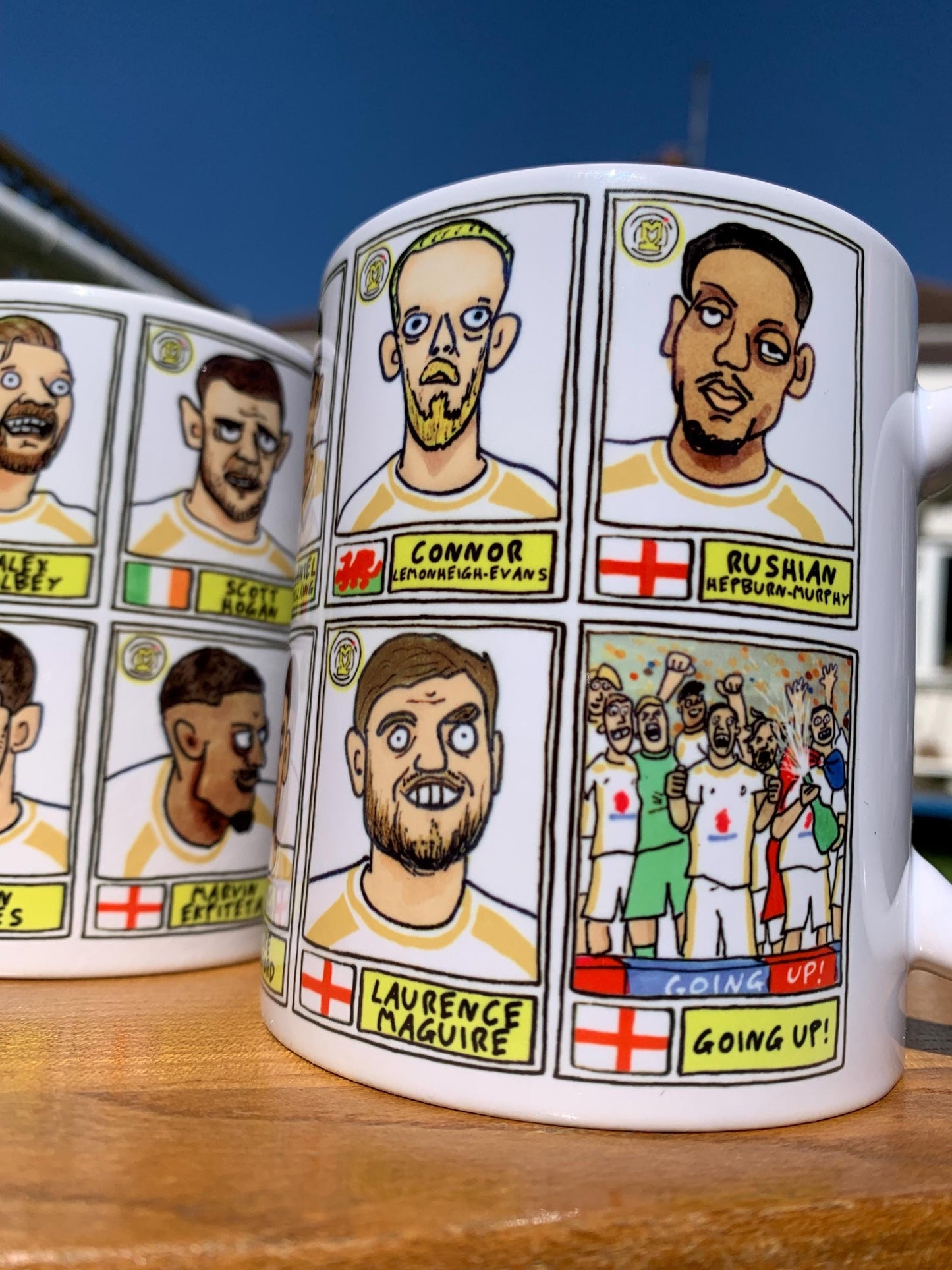 MK Dons - Dons Going Up No Score Draws Mug Set - Set of Two DIFFERENT 11oz Ceramic Mugs with Wonky Doodles Of MKDFC 25/26 Promotion-Winners