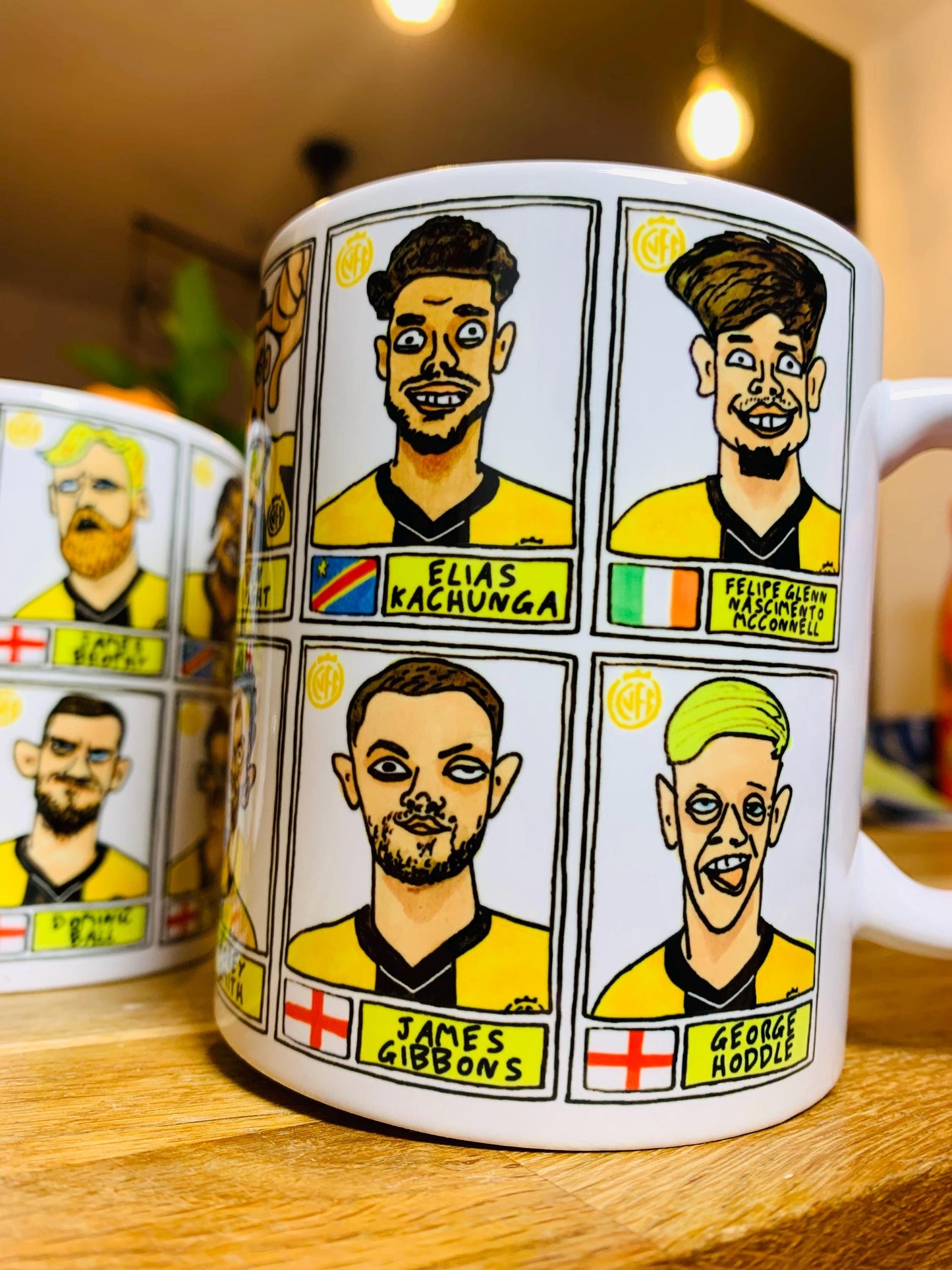 Cambridge Utd Vol 2 - U's Going Up No Score Draws Mug Set - Set of TWO DIFFERENT 11oz Ceramic Mugs with Wonky CUFC 25/26 Promotion Doodles