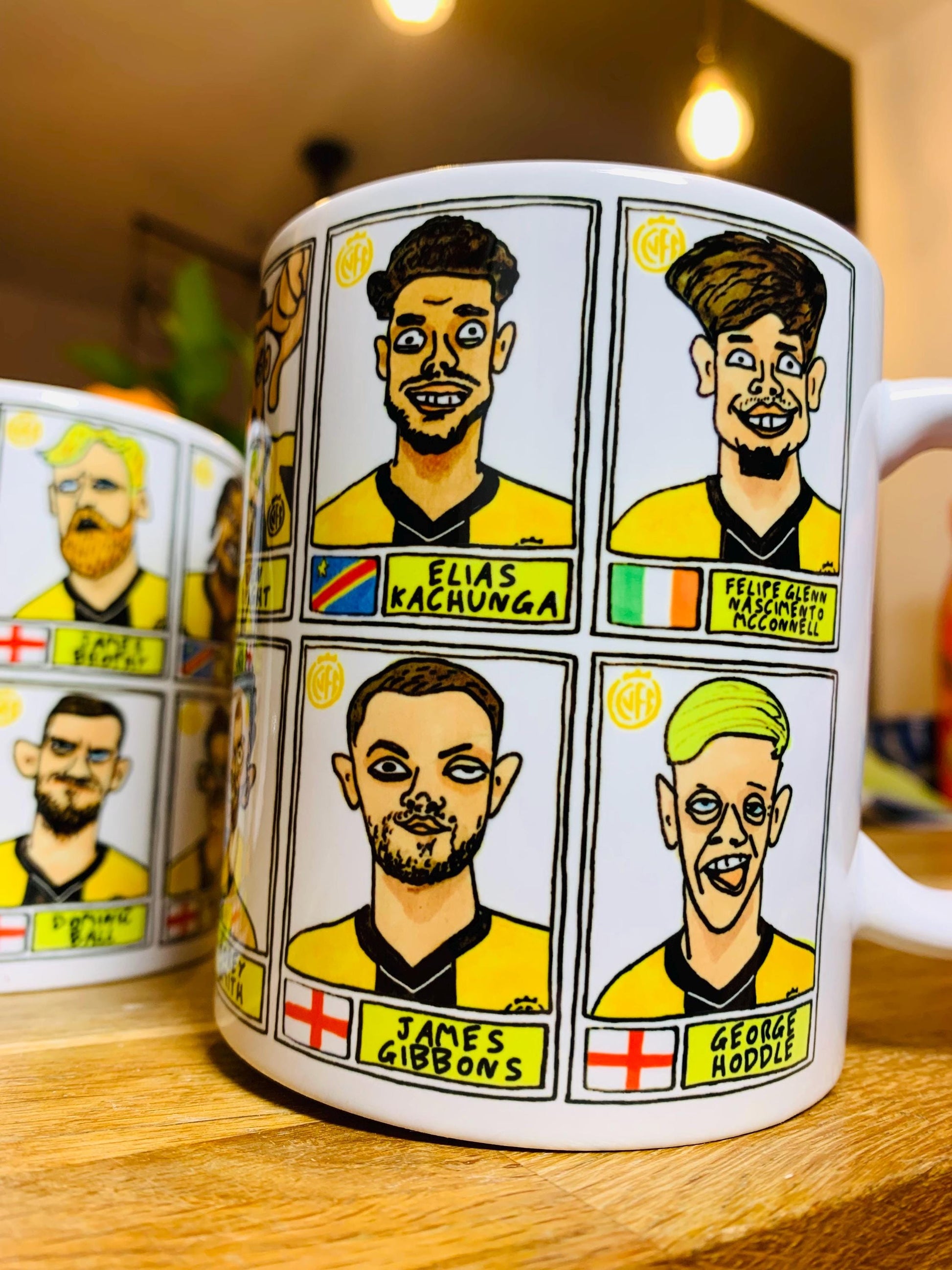 Cambridge Utd Vol 2 - U's Going Up No Score Draws Mug Set - Set of TWO DIFFERENT 11oz Ceramic Mugs with Wonky CUFC 25/26 Promotion Doodles