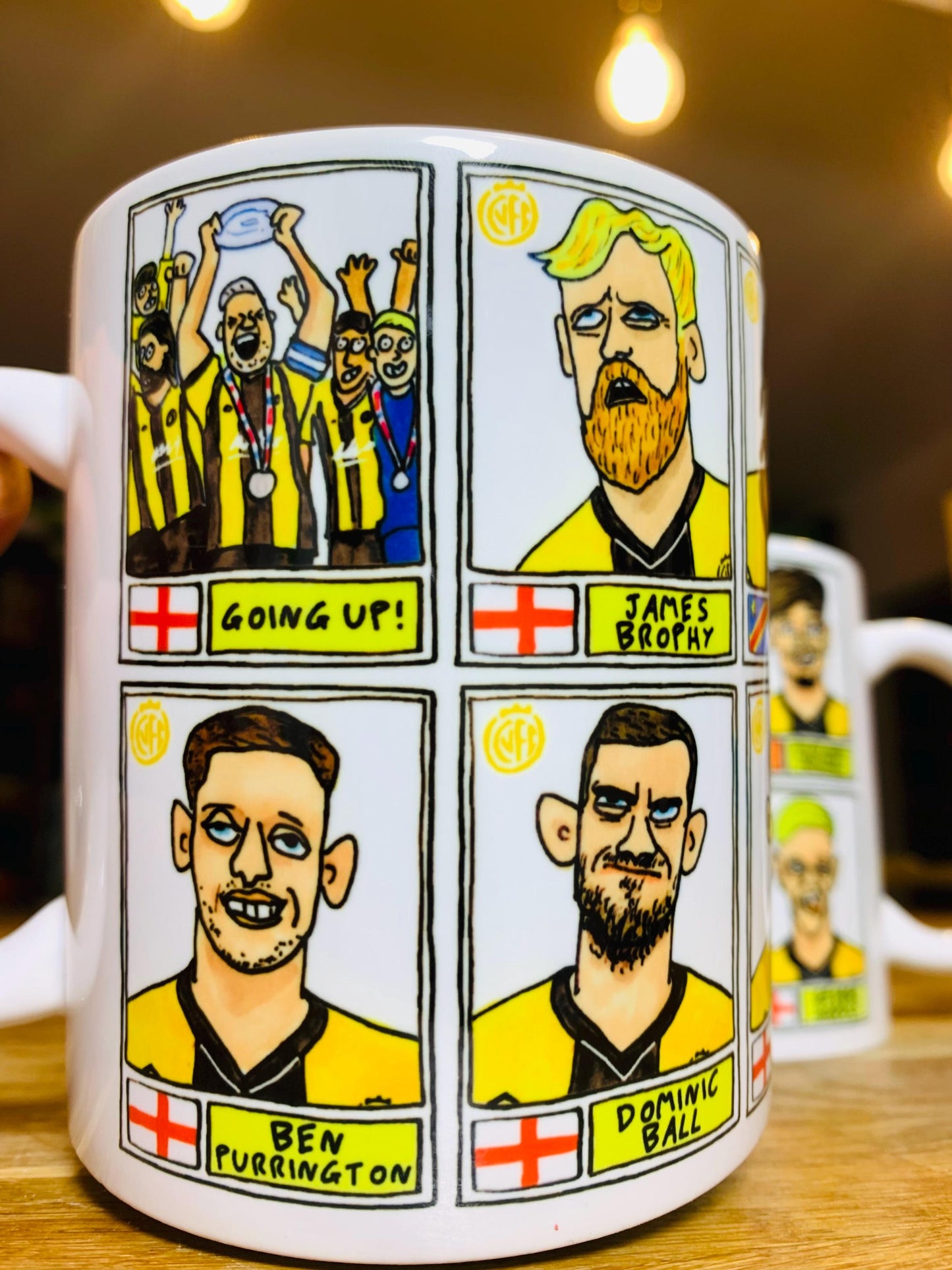Cambridge Utd Vol 2 - U's Going Up No Score Draws Mug Set - Set of TWO DIFFERENT 11oz Ceramic Mugs with Wonky CUFC 25/26 Promotion Doodles