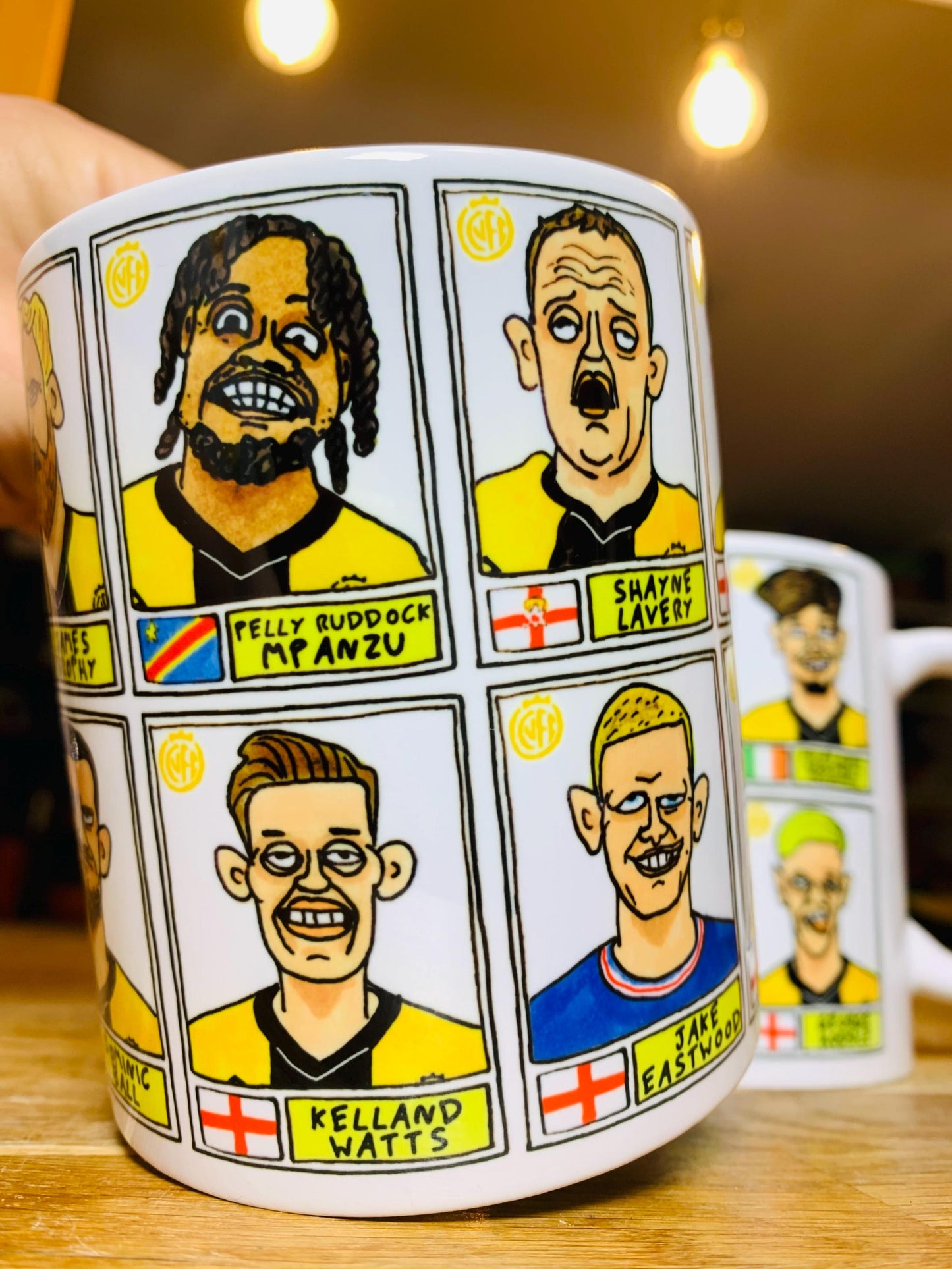 Cambridge Utd Vol 2 - U's Going Up No Score Draws Mug Set - Set of TWO DIFFERENT 11oz Ceramic Mugs with Wonky CUFC 25/26 Promotion Doodles