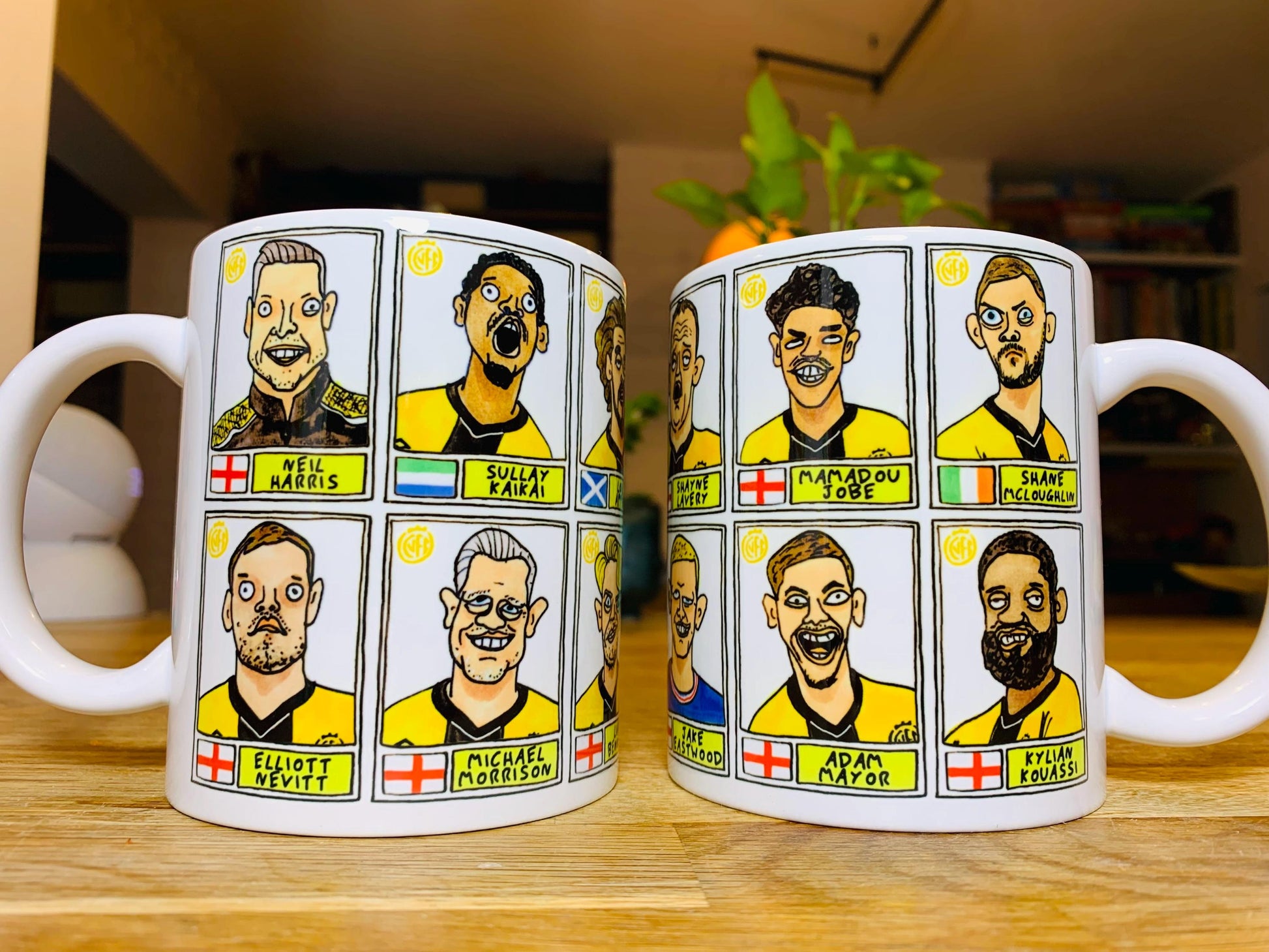 Cambridge Utd Vol 2 - U's Going Up No Score Draws Mug Set - Set of TWO DIFFERENT 11oz Ceramic Mugs with Wonky CUFC 25/26 Promotion Doodles