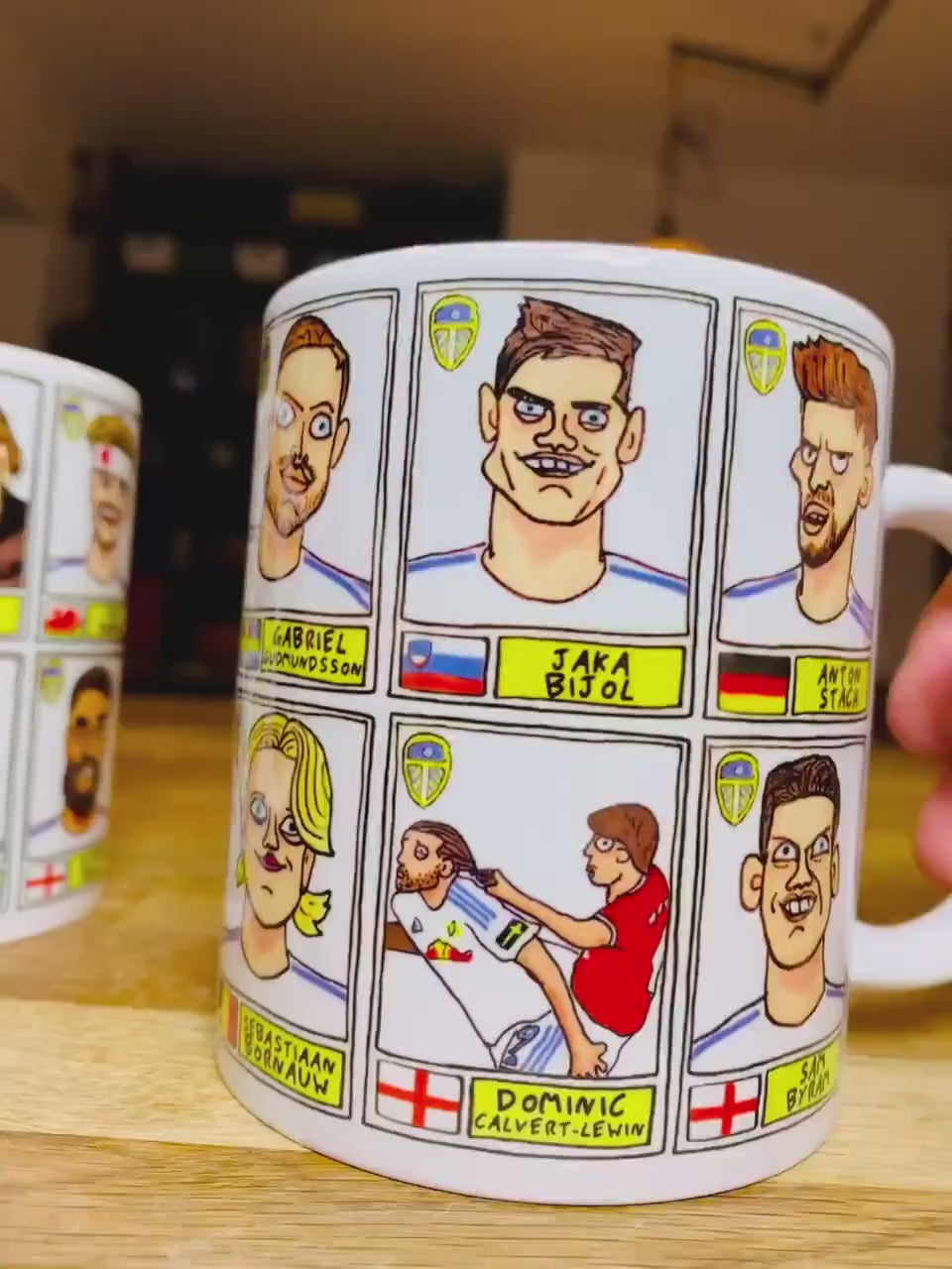 Leeds United 25/26 No Score Draws Mug Set - Set of TWO DIFFERENT 11oz Ceramic Mugs with Wonky Panini-Doodles Of Daniel Farke's PL Squad