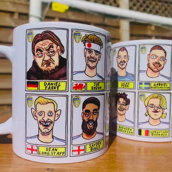 Leeds United 25/26 No Score Draws Mug Set - Set of TWO DIFFERENT 11oz Ceramic Mugs with Wonky Panini-Doodles Of Daniel Farke's PL Squad