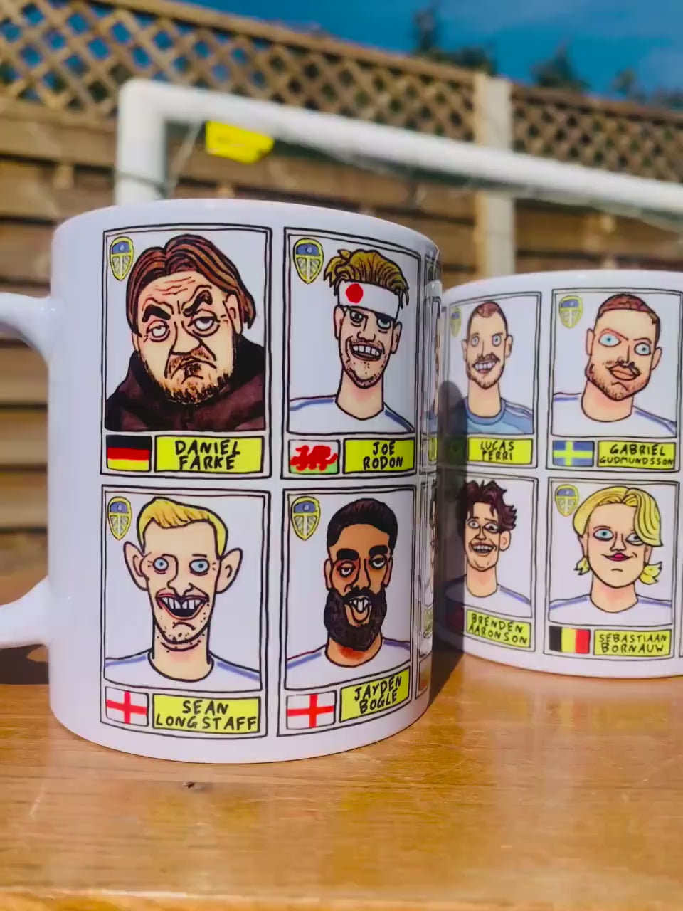 Leeds United 25/26 No Score Draws Mug Set - Set of TWO DIFFERENT 11oz Ceramic Mugs with Wonky Panini-Doodles Of Daniel Farke's PL Squad