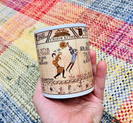 Hand Of God Bayeux Tapestry Mug By No Score Draws - 11oz Ceramic Mug Depicting An Historic Depiction of Diego Maradona's Goal v England 1986