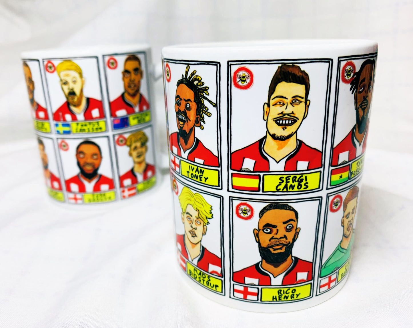 Brentford Vol 2 No Score Draws Mug Set - Set of TWO 11oz Ceramic Mugs with Wonky Panini-style No Score Draws Doodles Of BFCs playoff-winners