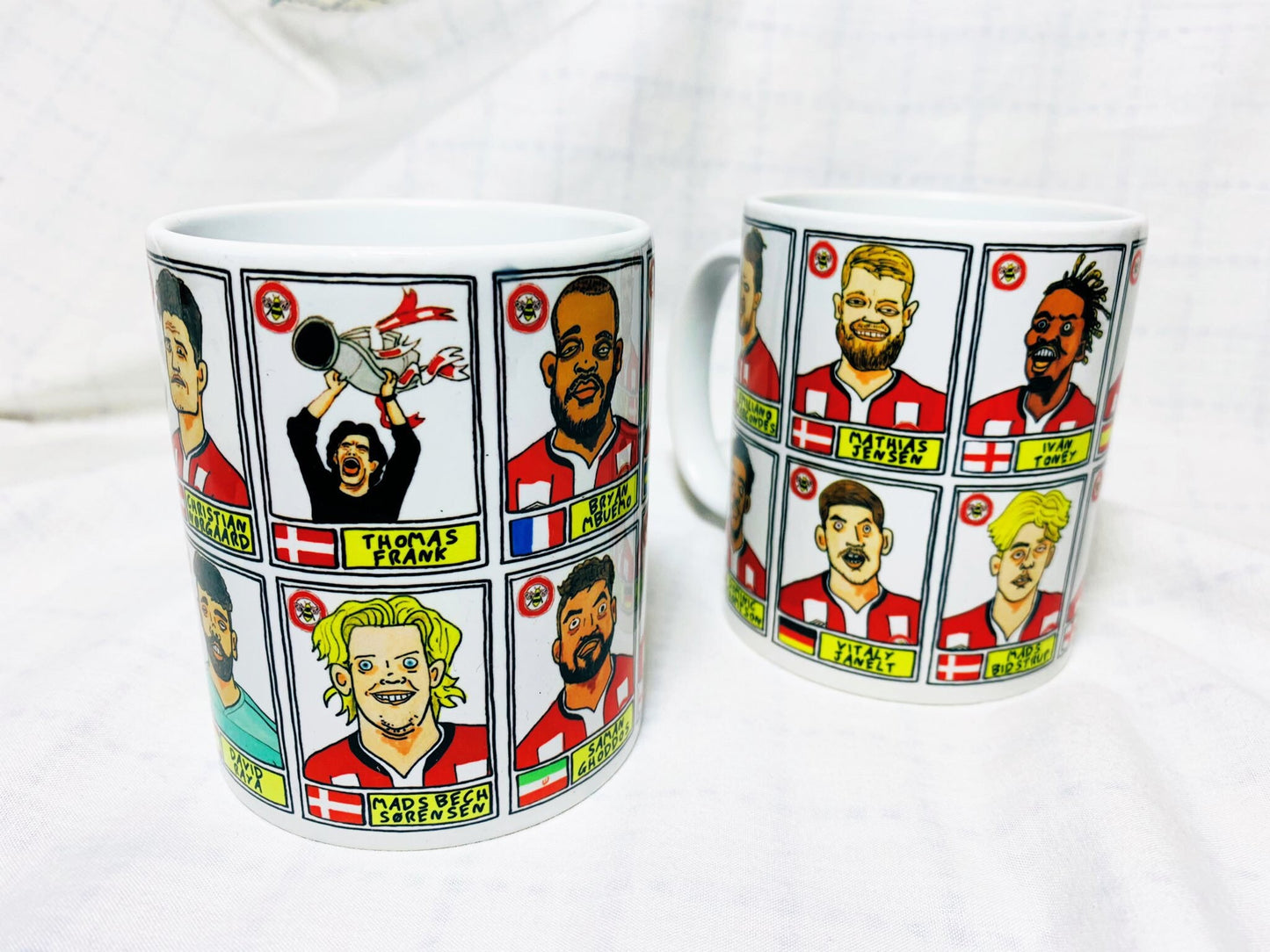 Brentford Vol 2 No Score Draws Mug Set - Set of TWO 11oz Ceramic Mugs with Wonky Panini-style No Score Draws Doodles Of BFCs playoff-winners