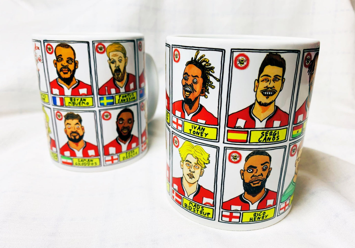 Brentford Vol 2 No Score Draws Mug Set - Set of TWO 11oz Ceramic Mugs with Wonky Panini-style No Score Draws Doodles Of BFCs playoff-winners