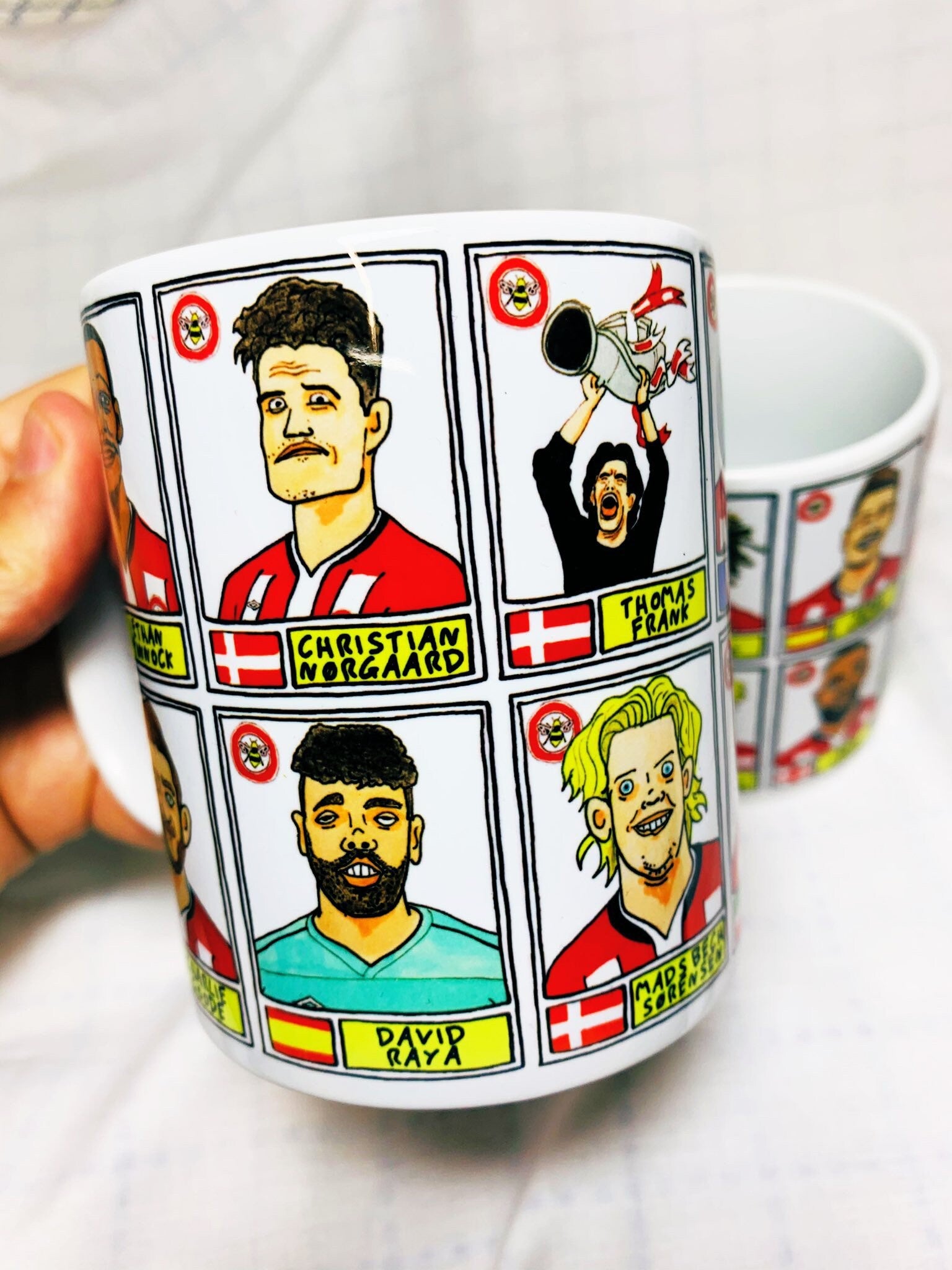 Brentford Vol 2 No Score Draws Mug Set - Set of TWO 11oz Ceramic Mugs with Wonky Panini-style No Score Draws Doodles Of BFCs playoff-winners