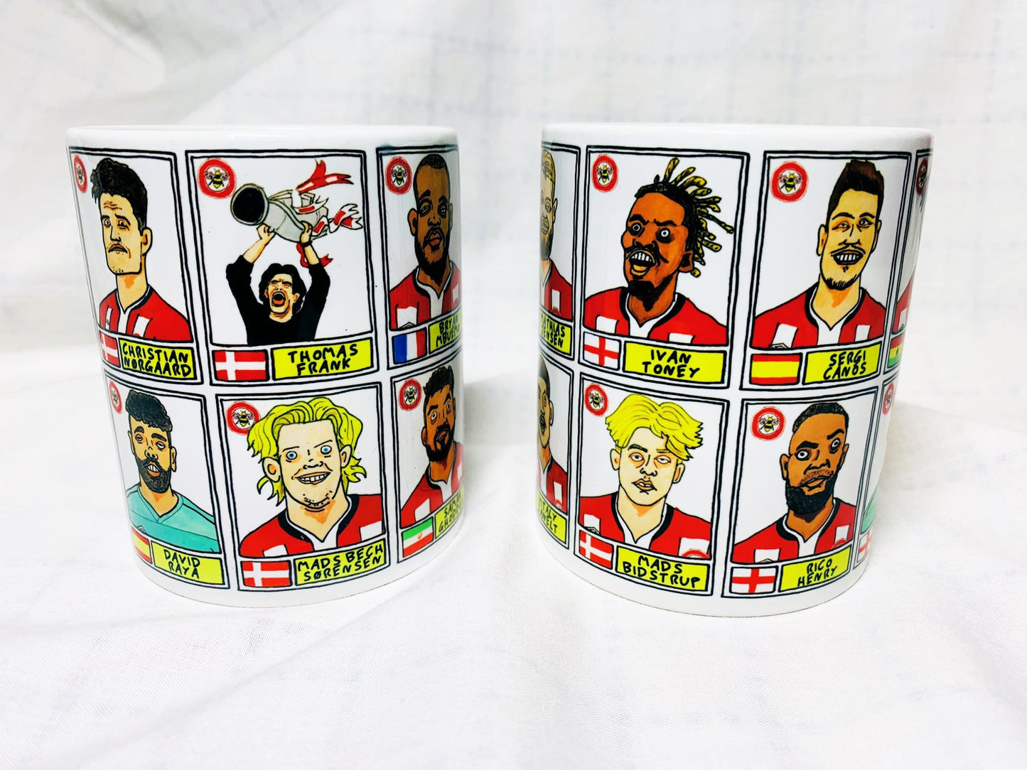 Brentford Vol 2 No Score Draws Mug Set - Set of TWO 11oz Ceramic Mugs with Wonky Panini-style No Score Draws Doodles Of BFCs playoff-winners