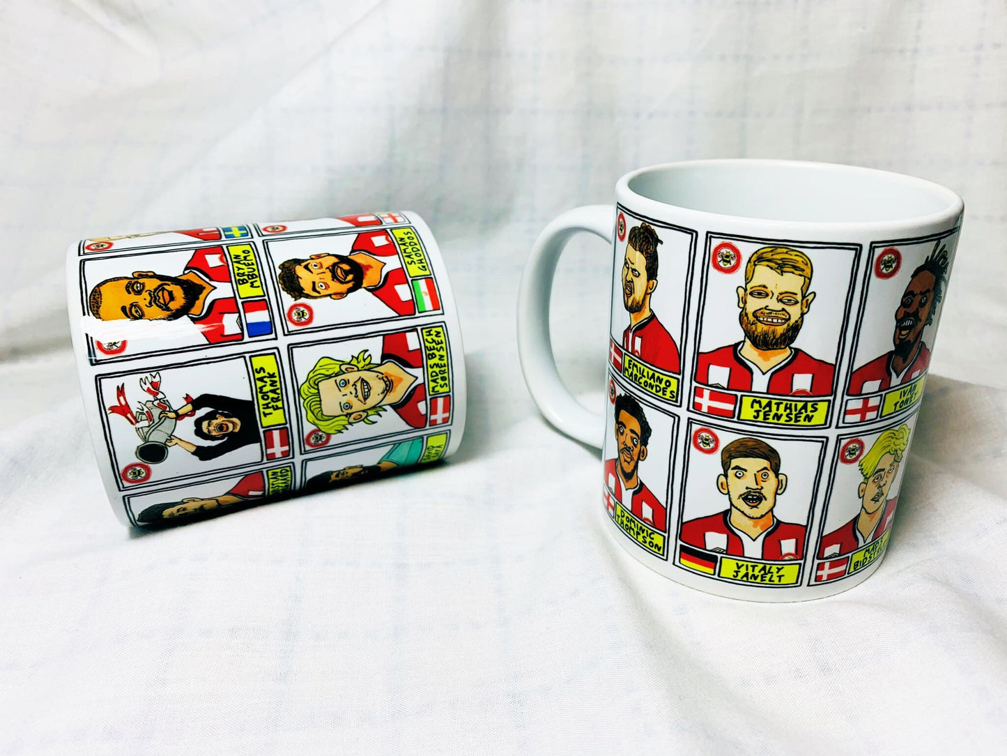 Brentford Vol 2 No Score Draws Mug Set - Set of TWO 11oz Ceramic Mugs with Wonky Panini-style No Score Draws Doodles Of BFCs playoff-winners