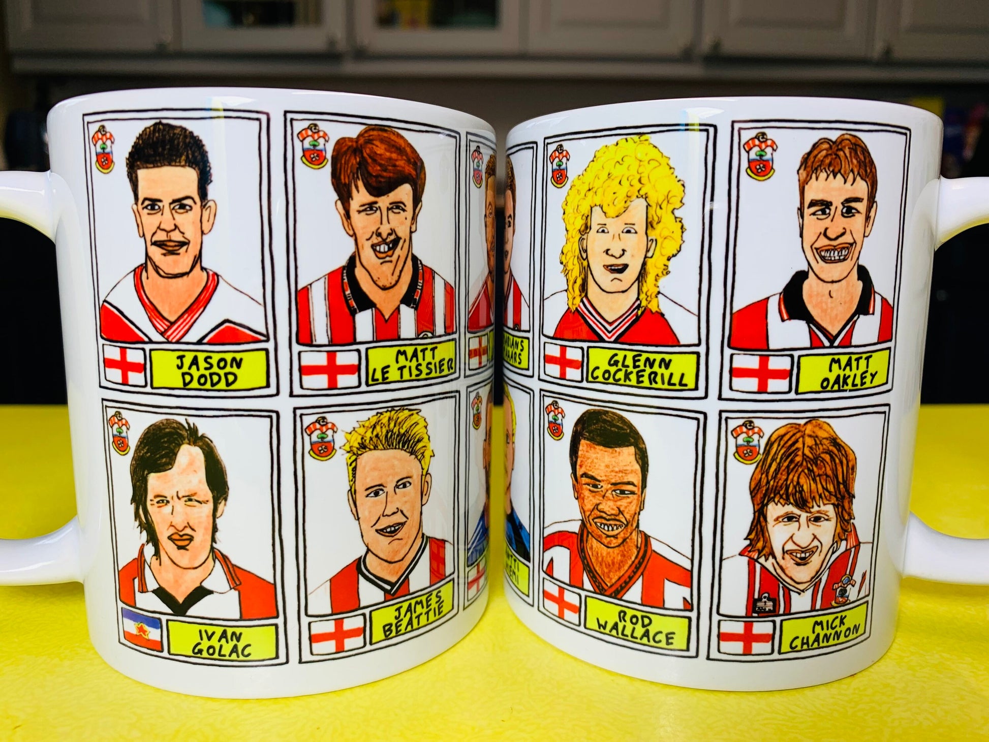 Southampton - Set of TWO 11oz Ceramic Mugs with Wonky Panini sticker-style No Score Draws Doodles of 24 Saints icons