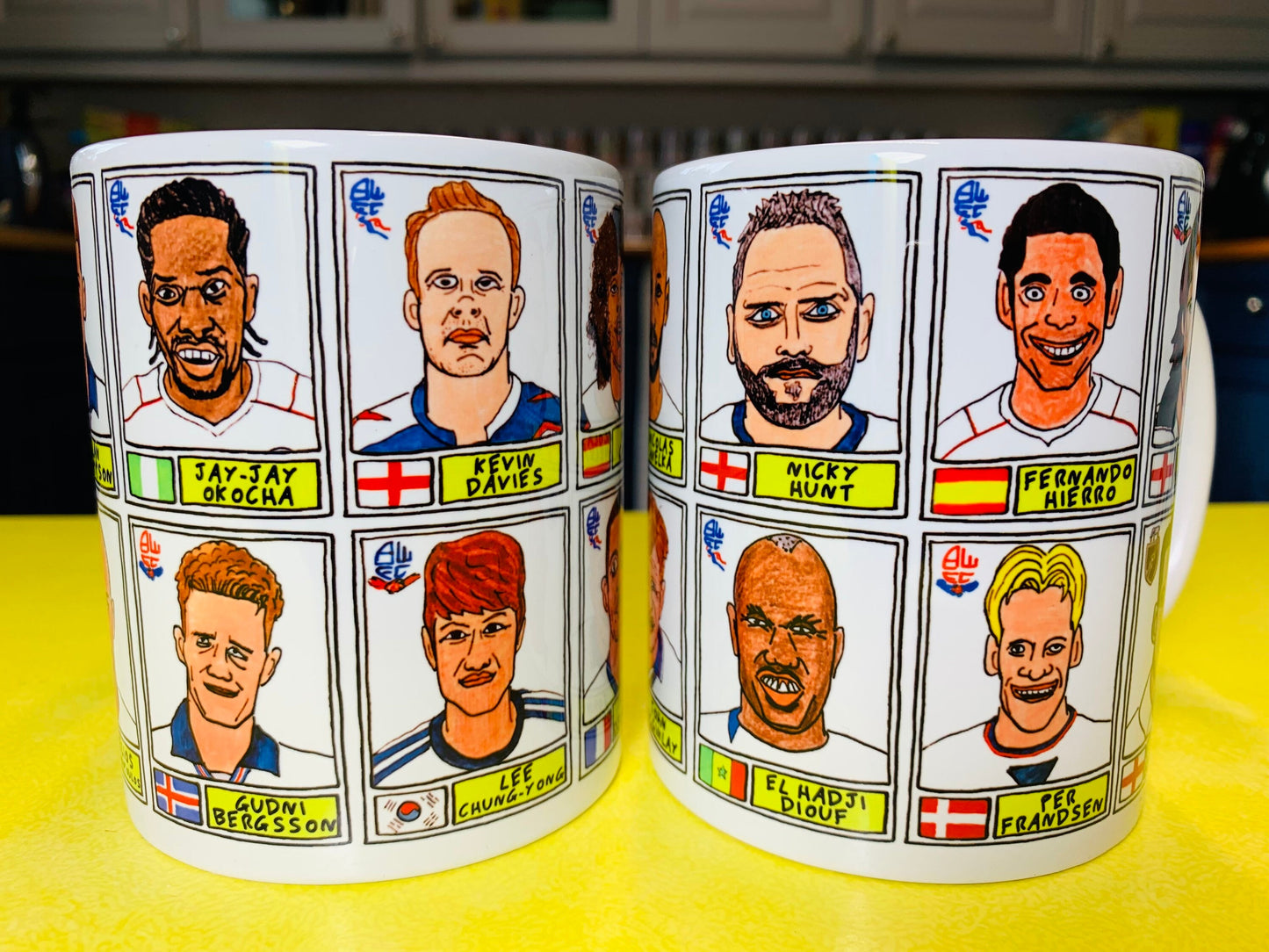 Bolton Wanderers No Score Draws Mug Set - Set of TWO 11oz Ceramic Mugs with Wonky Panini sticker-style No Score Draws Doodles of BWFC icons