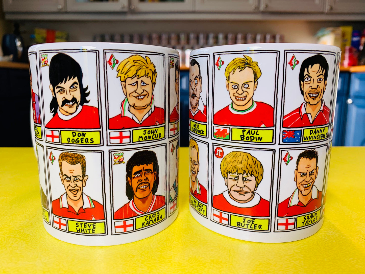 Swindon Town No Score Draws Mug Set - Set of TWO 11oz Ceramic Mugs with Wonky Panini sticker-style No Score Draws Doodles of 24 STFC icons