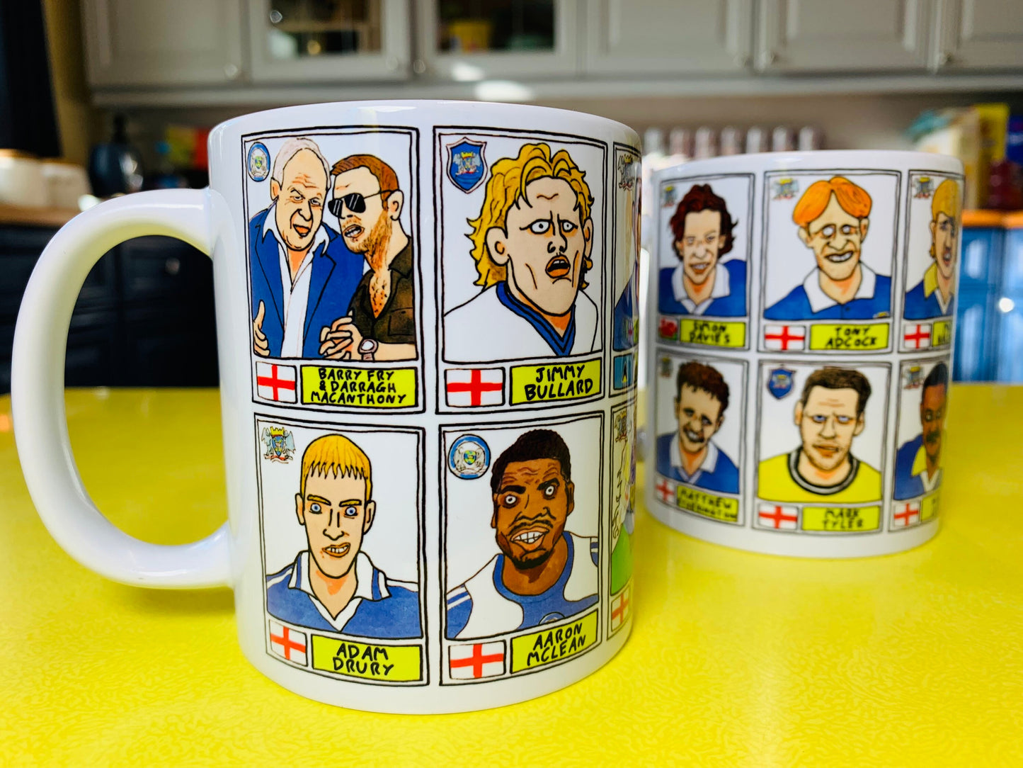 Peterborough Utd Vol 2 Mug Set - Set of TWO 11oz Ceramic Mugs with Wonky Panini-style No Score Draws Doodles of various historic PUFC icons