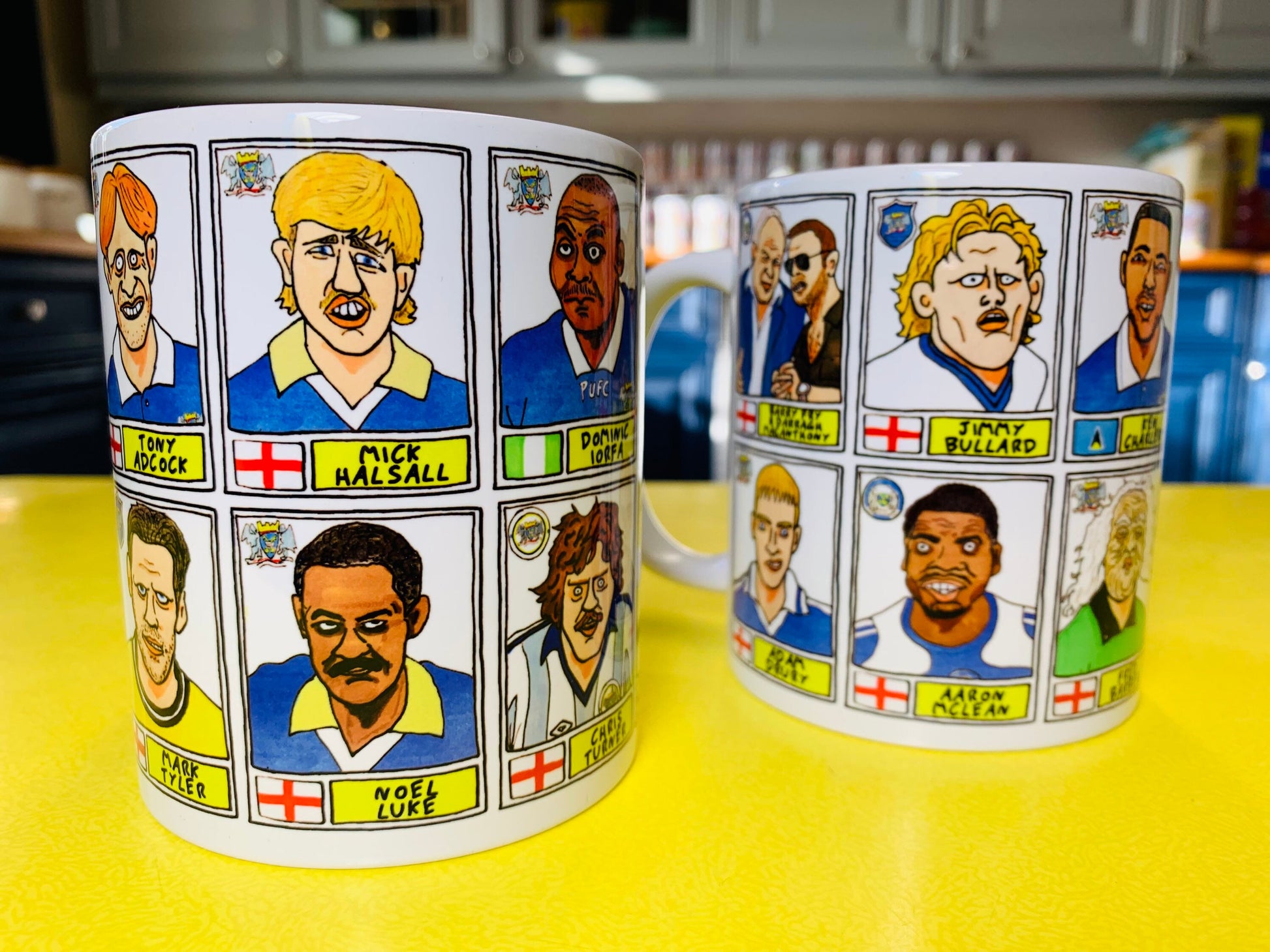 Peterborough Utd Vol 2 Mug Set - Set of TWO 11oz Ceramic Mugs with Wonky Panini-style No Score Draws Doodles of various historic PUFC icons