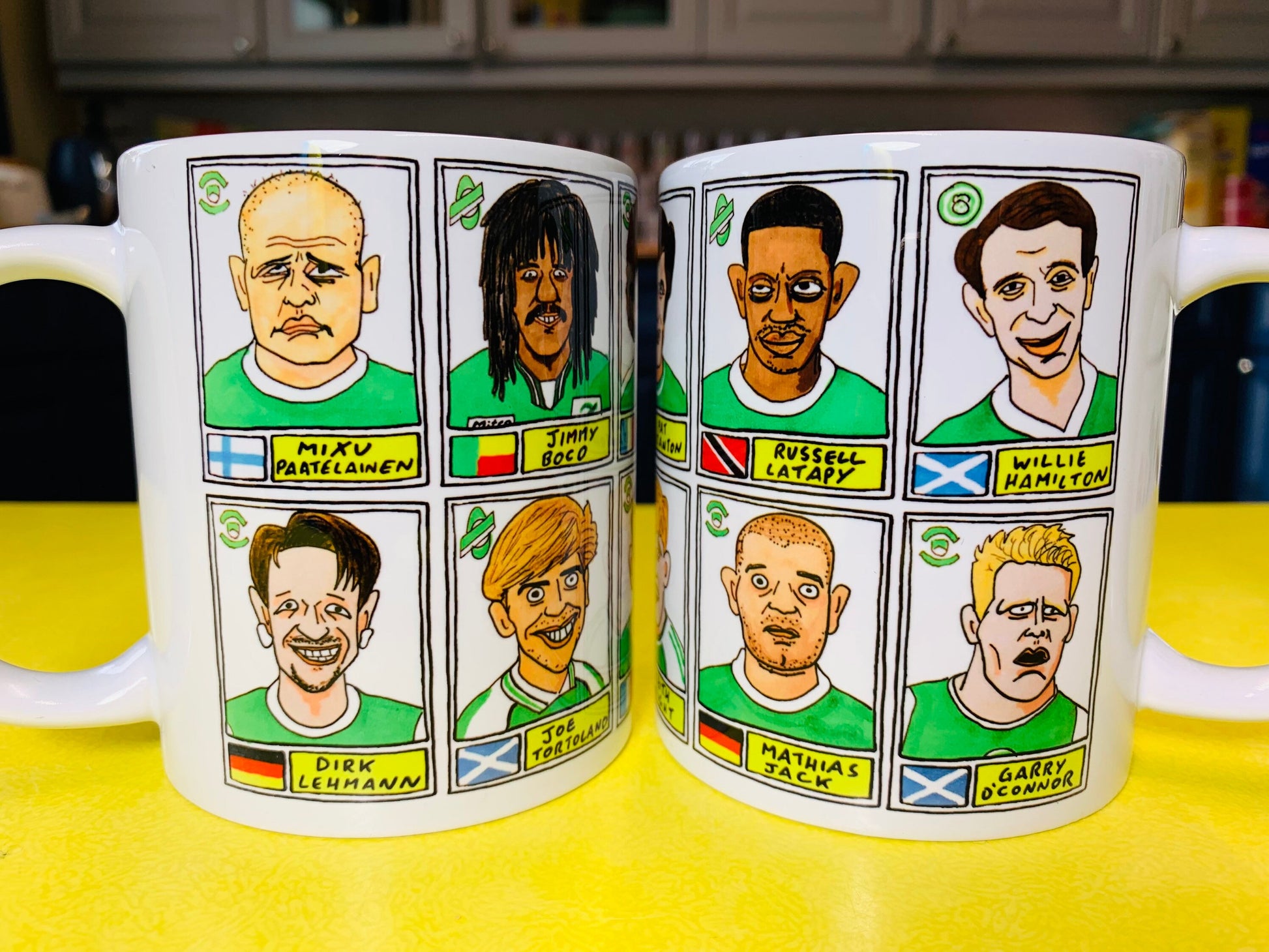 Hibs No Score Draws Mug Set - Set of TWO 11oz Ceramic Mugs with Wonky Panini sticker-style No Score Draws Doodles of 24 Hibernian icons