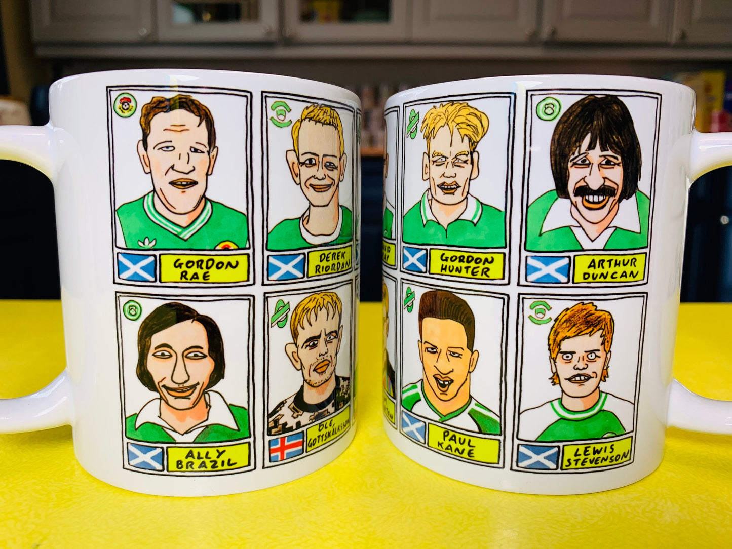 Hibs No Score Draws Mug Set - Set of TWO 11oz Ceramic Mugs with Wonky Panini sticker-style No Score Draws Doodles of 24 Hibernian icons