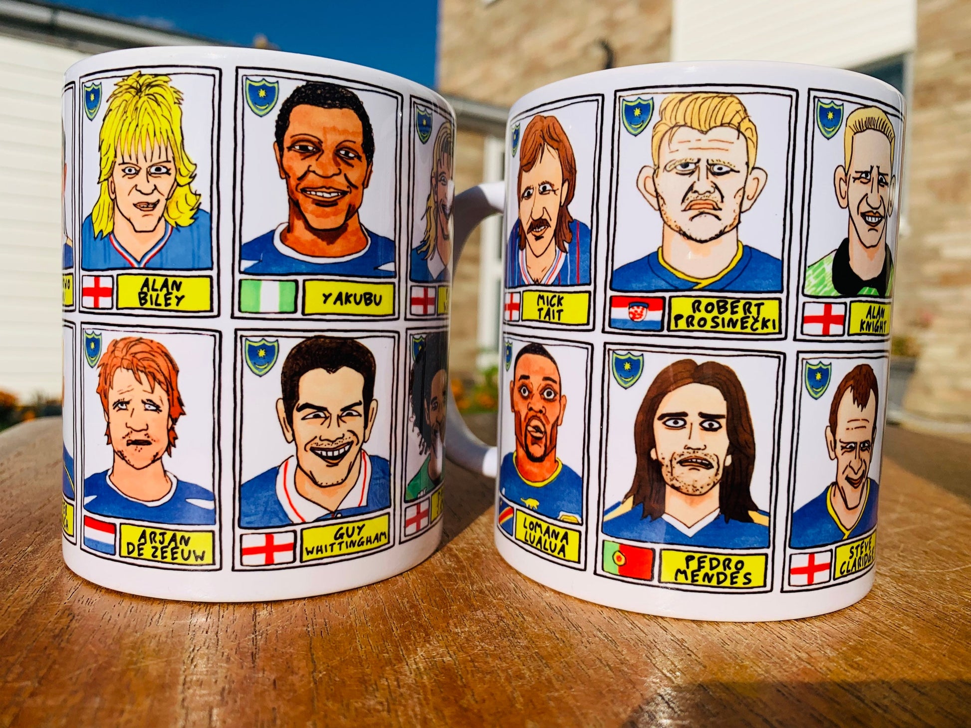 Portsmouth No Score Draws Mug Set - Set of TWO 11oz Ceramic Mugs with Wonky Panini sticker-style No Score Draws Doodles of 24 Pompey icons